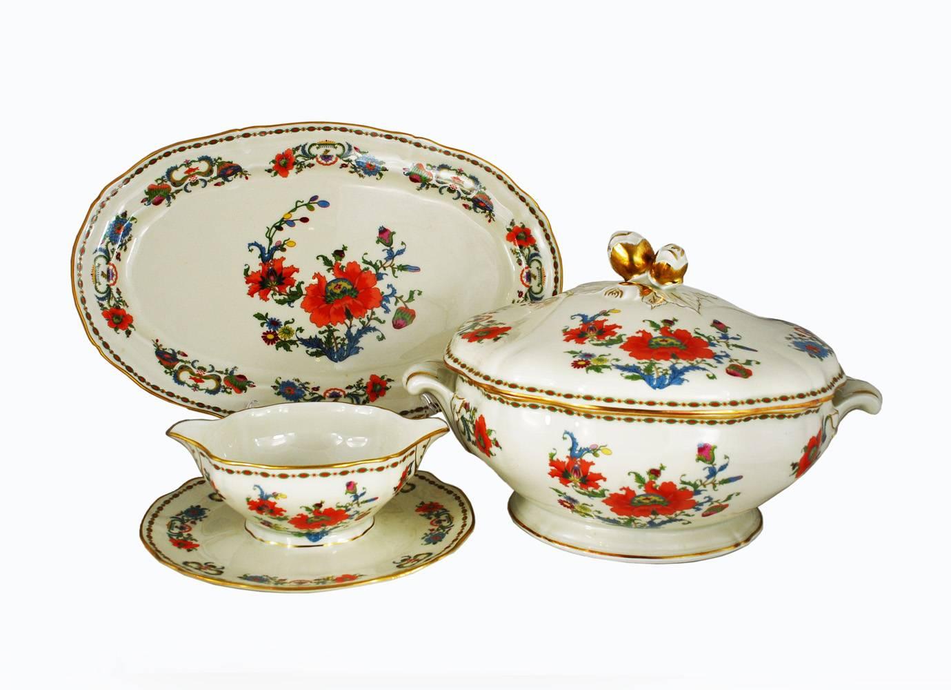 An exquisite limoges dinner service for eight featuring the vibrant Ceralene Vieux Chine pattern. This service was made by special order with cups decorated inside. Service includes eight each of dinner plates, salad plates, soup bowls, bread plates