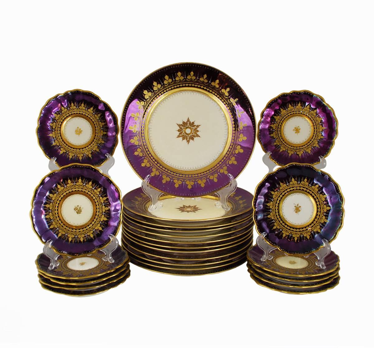 Spectacular porcelain Dresden hand painted set featuring 10 dessert plates, 10 footed cups and 10 saucers.

Each item has a deep, lustrous purple ground color and contrasting bright gilt work with solid bands, repeating leaf motif and raised gilt
