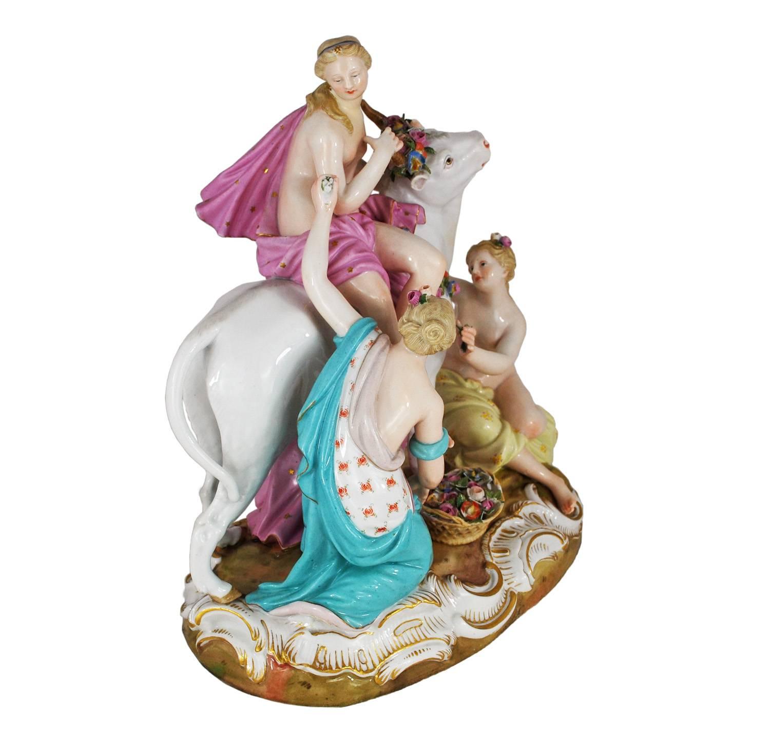 This famous porcelain group depicts the myth of Europa being captivated by Zeus in the form of a beautiful white bull. Meissen's renowned artists capture every detail in full, gorgeous color. Some of the piece's stunning features include: intricate