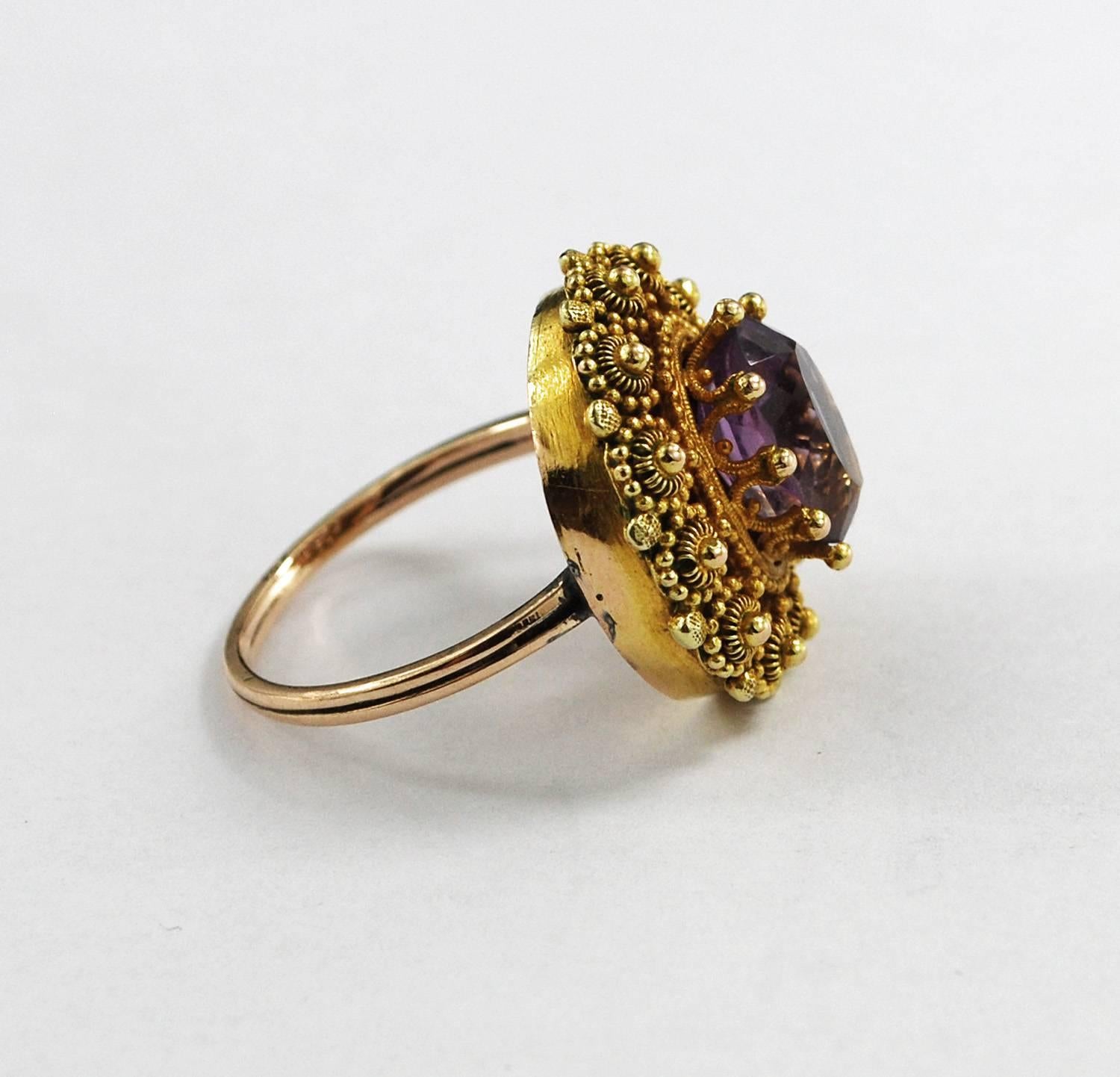 Very rare antique, early 19th century gold ring with oval cut amethyst. Stone is 3/8
