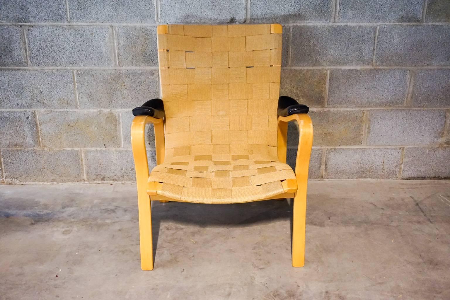 Swedish Mid-Century lounge chair designed by G. A. Berg, manufactured by Bröderna Andersson Ekenässjön, Sweden, circa 1960.