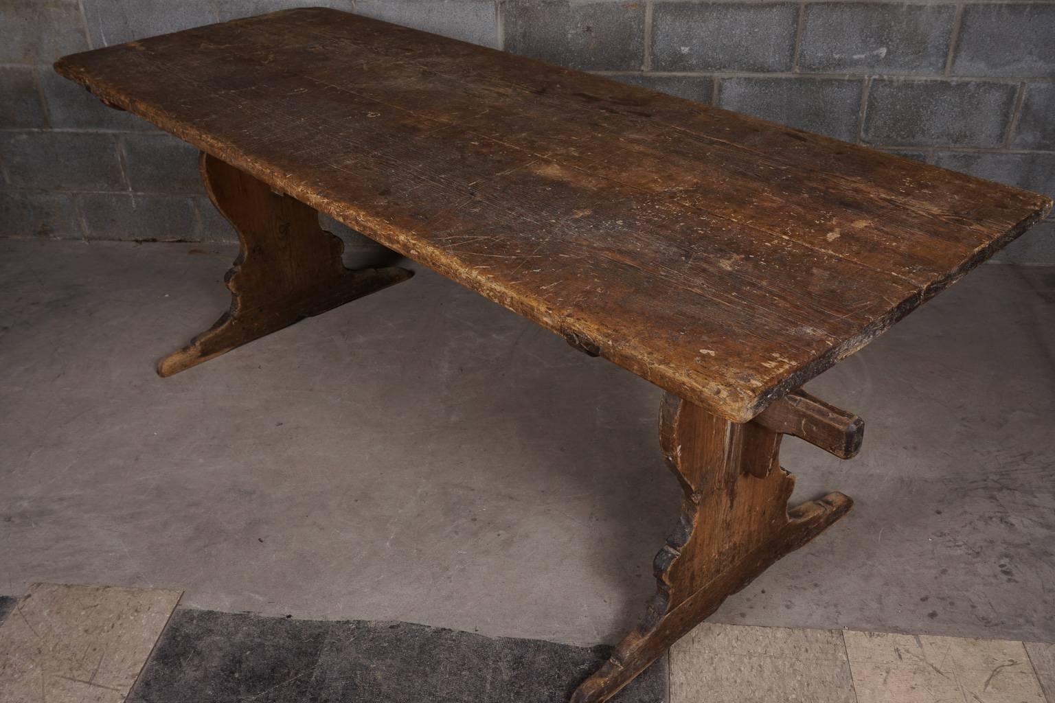 Early 19th century dining table from Sweden. Rare model with a fantastic patina. Two-plank top in pine.