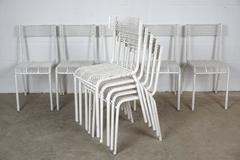 Set of Ten White Rene Malaval Chairs