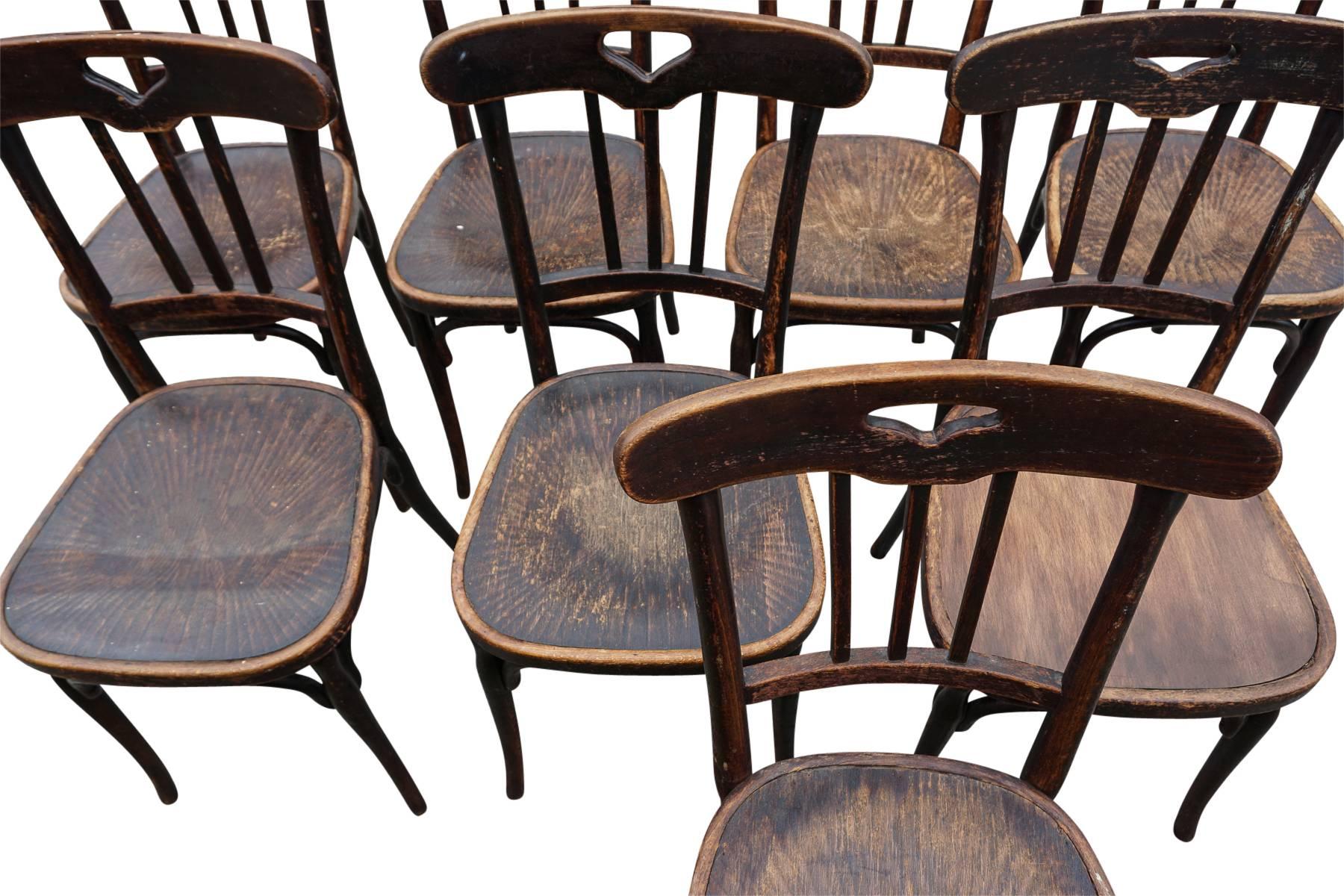 Eight bistro chairs from a theatre in France, manufactured by J & J Kohn, Austria. One seat replaced. Very good quality and design.