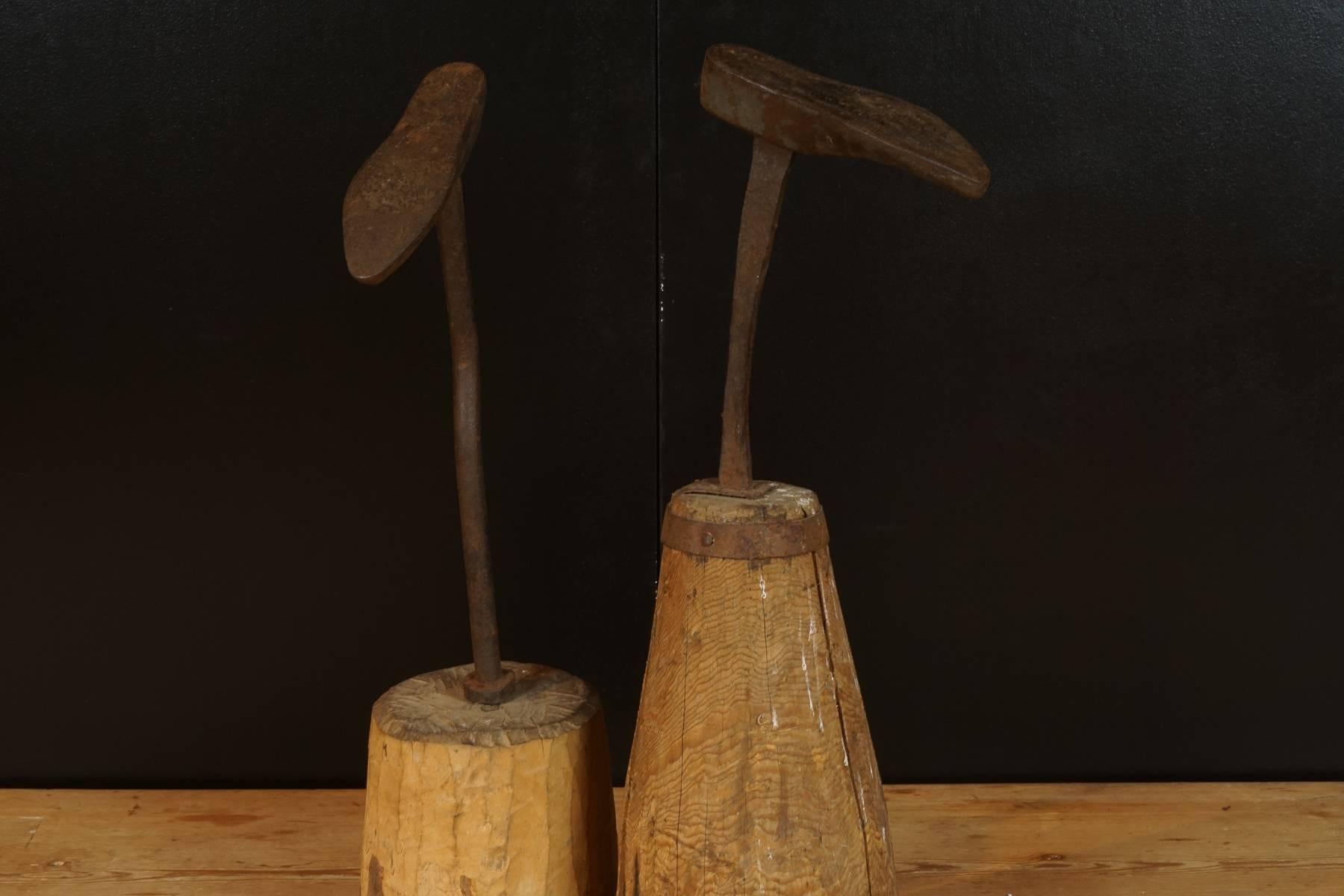 Pair of cobbler molds from Sweden, circa 1880. Iron molds mounted on wood bases.