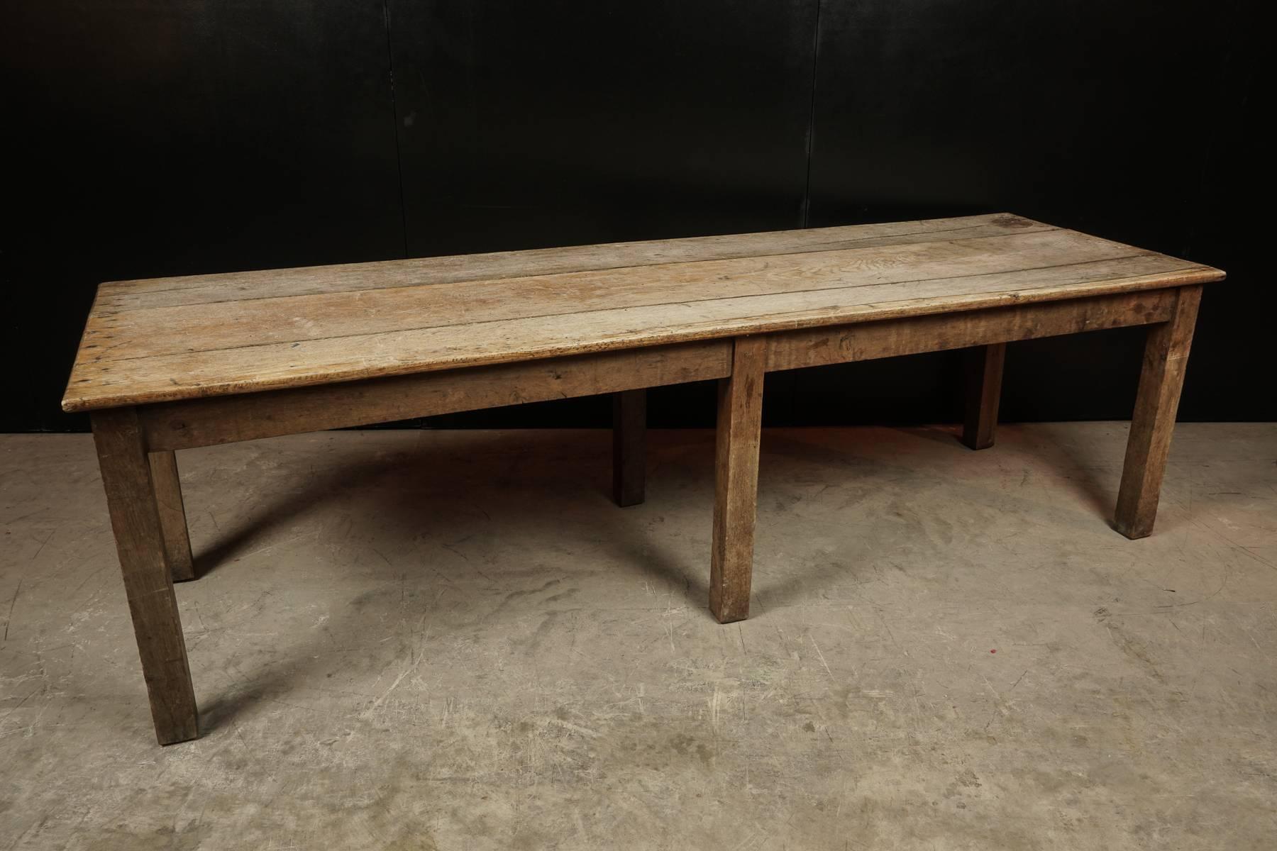 Large oak dining table from France, circa 1940.
