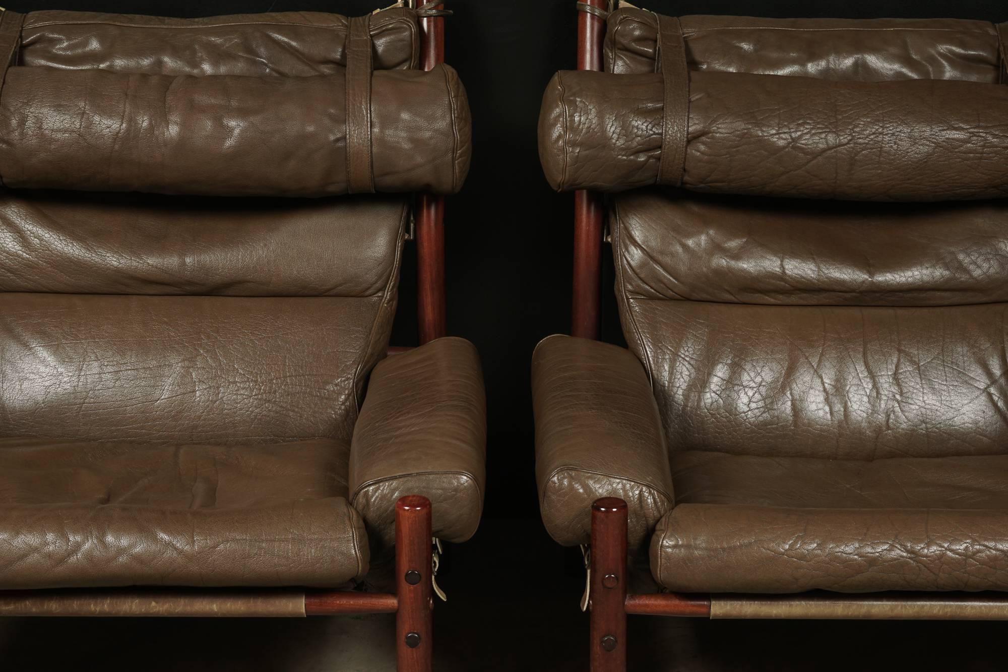 Pair Of Lounge Chairs Designed By Arne Norell, Model Inca, Circa 1970.  Original brown leather upholstery on a beech frame.  