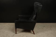 Kurt Ostervig: Ledersessel mit Flügelrückenlehne aus Dänemark, um 1970