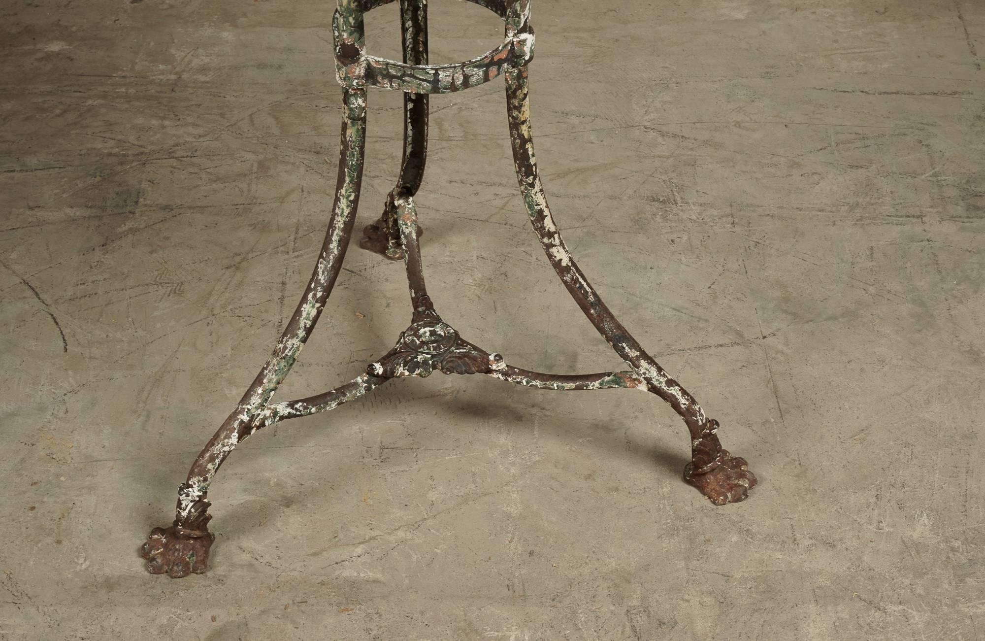 19th Century Bistro Table From Arras.  Traces of original paint with manufacturer's label on base.

