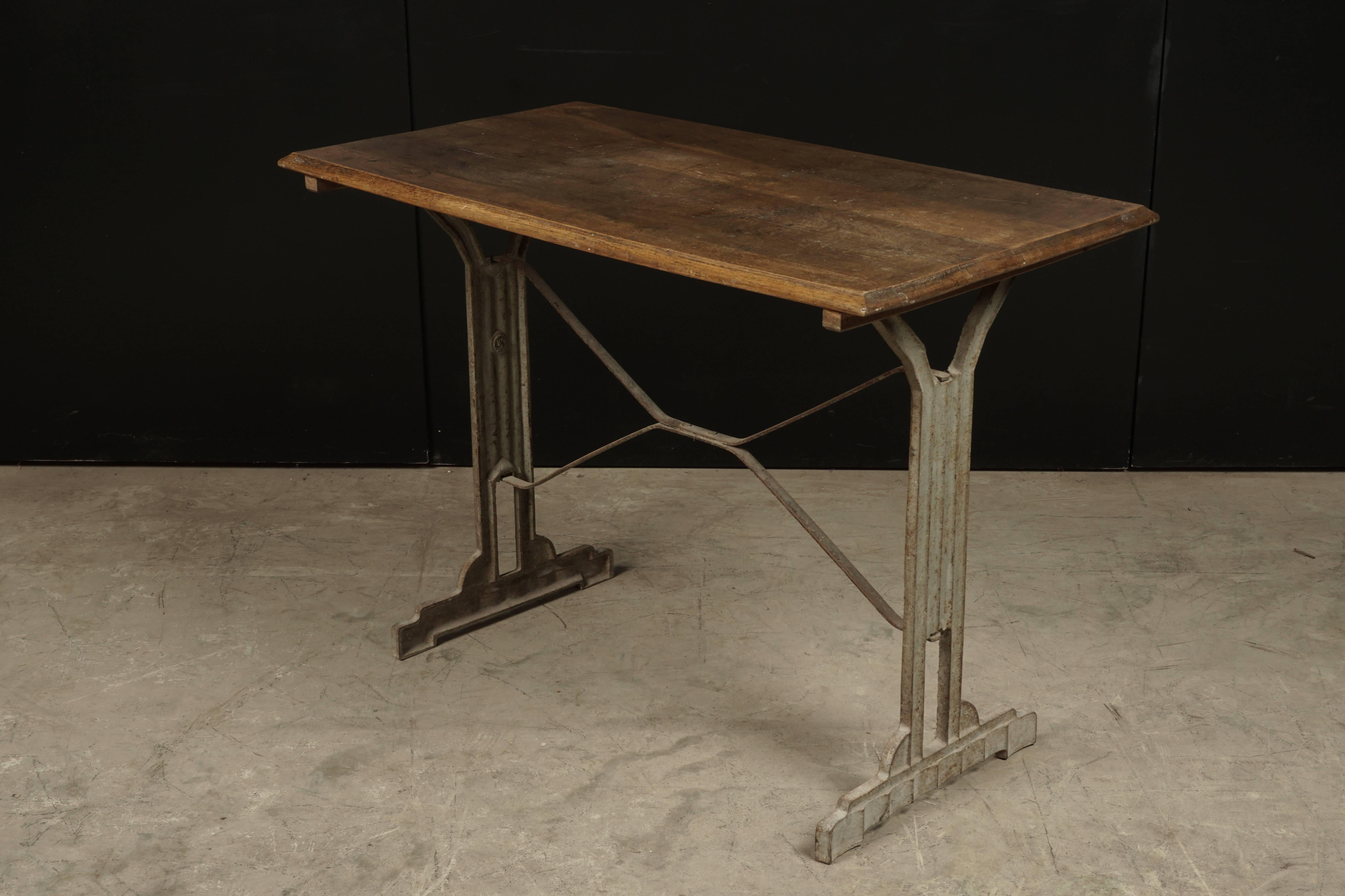 French Art Deco Bistro Table, Circa 1940.  Oak top with a metal base.