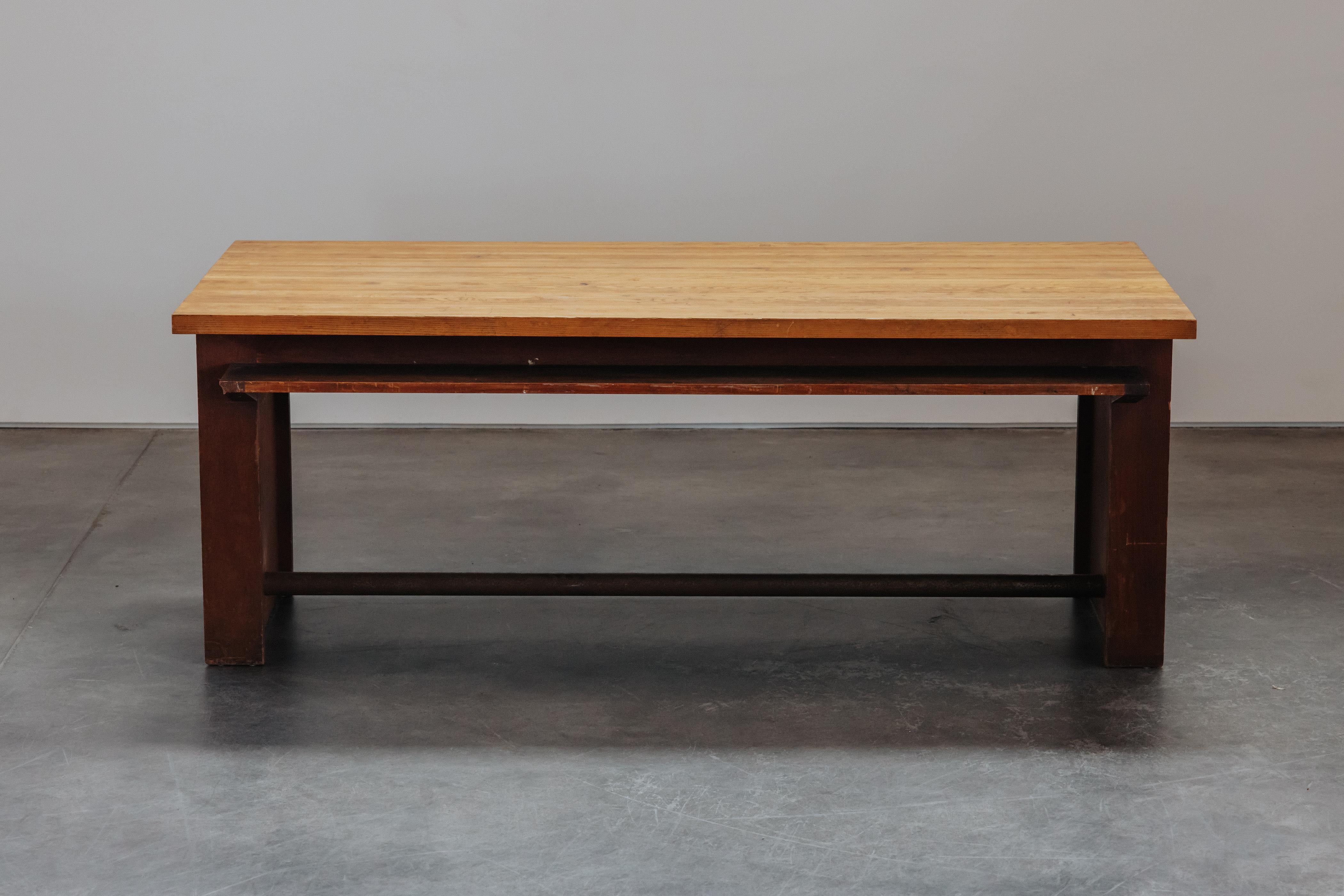 Rare Library Table from the University of Jussieu, Paris, circa 1958.  Superb model in the manner of Prouve.  Solid pine top on an oak base and steel stretcher.  Nice patina and use.