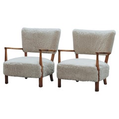 Vintage Pair Of Shearling Cabinetmaker Lounge Chairs From Denmark, Circa 1960.