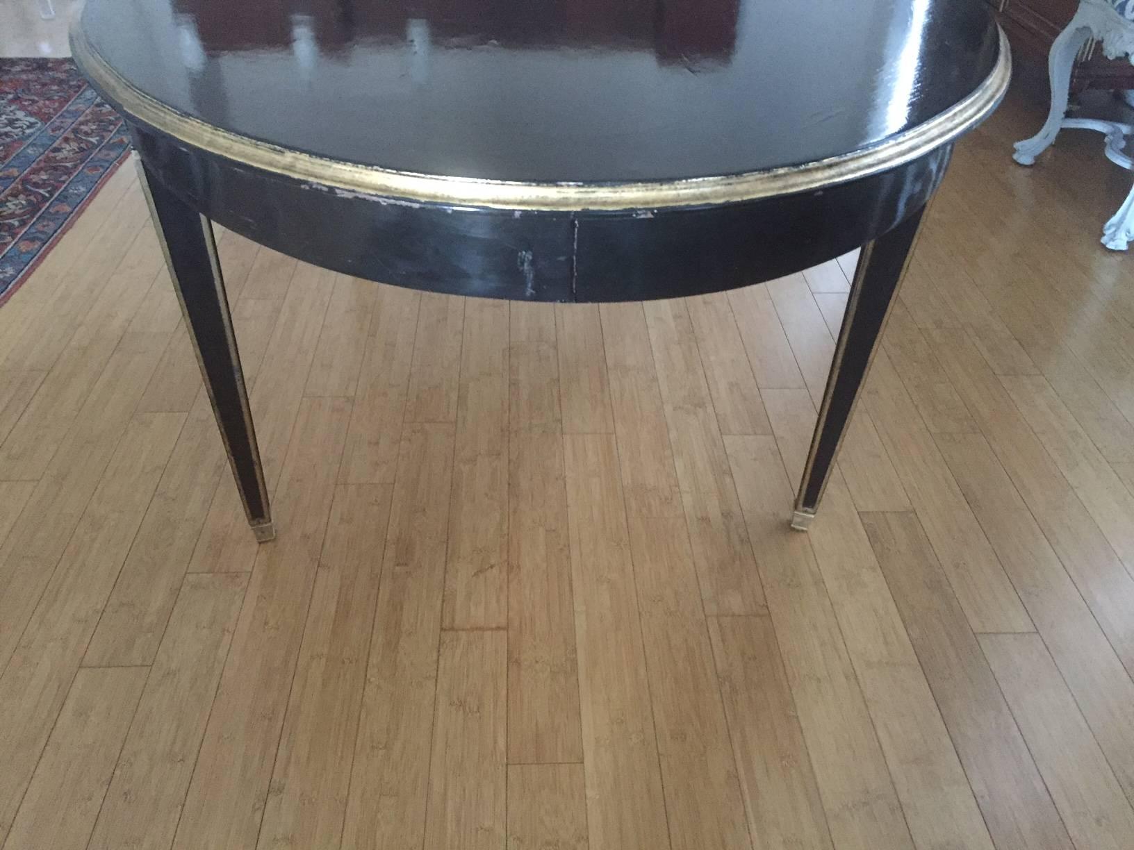 European Louis XVI Style Dining Table in Black with Gilt Accents For Sale