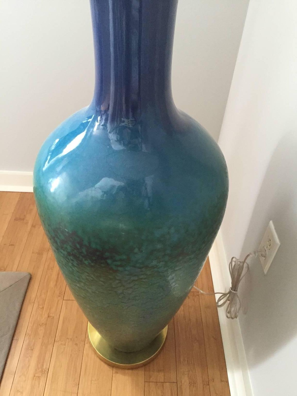 Blue and green glazed vintage floor lamp with brass base. The height to top of pottery part of lamp is 42
