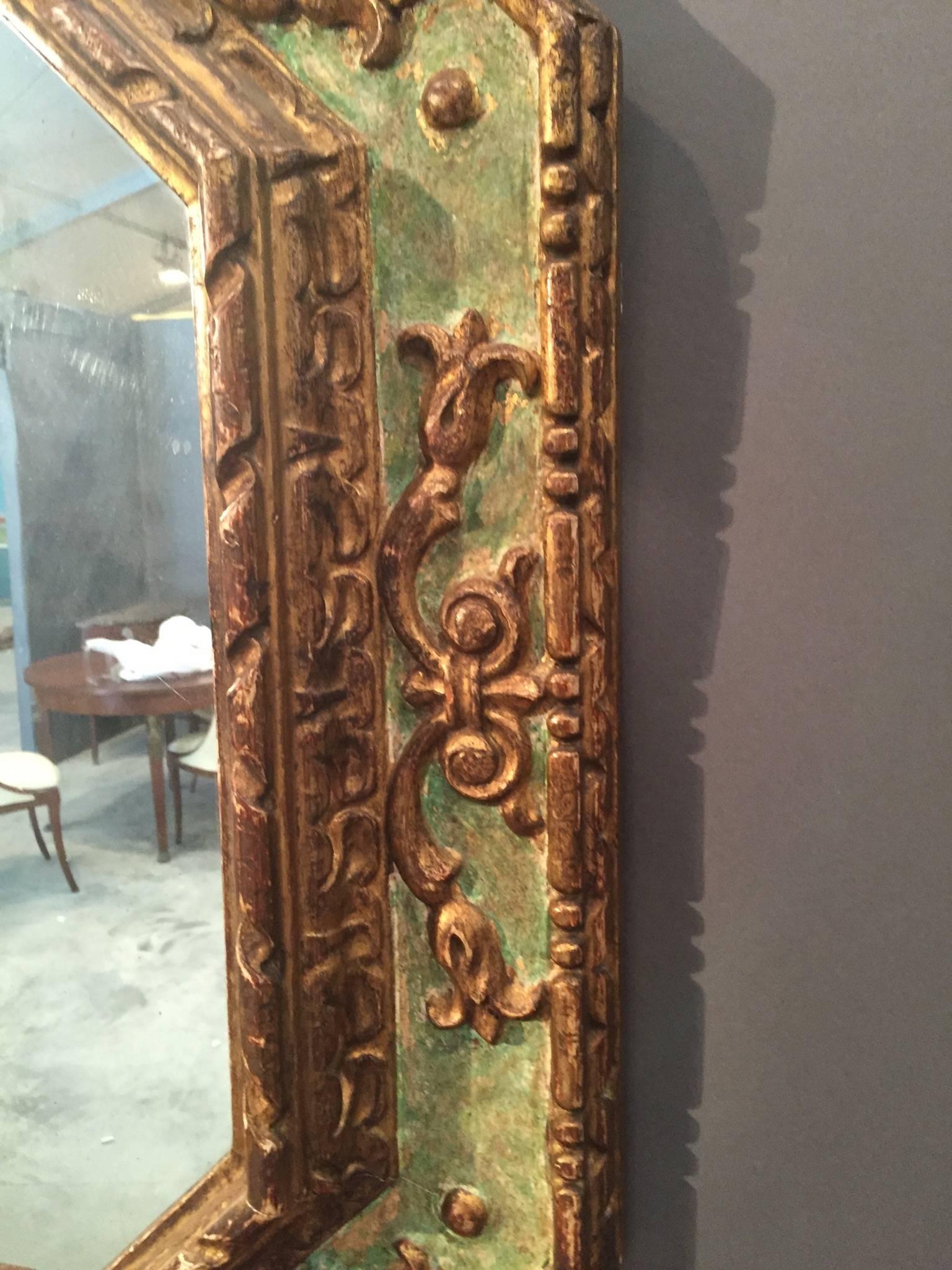 A painted and gilt Italian mirror.