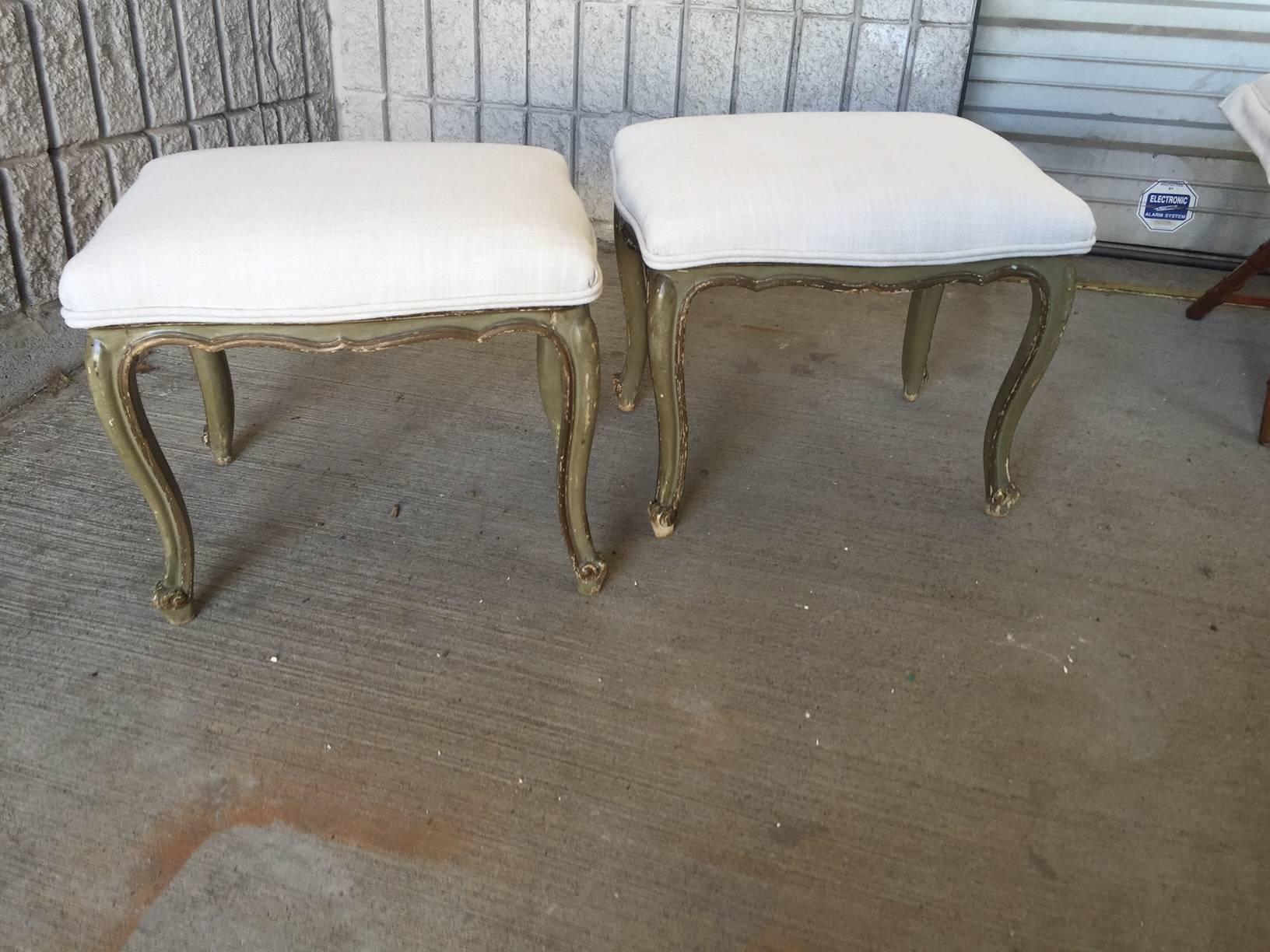 Pair of painted benches, newly upholstered.