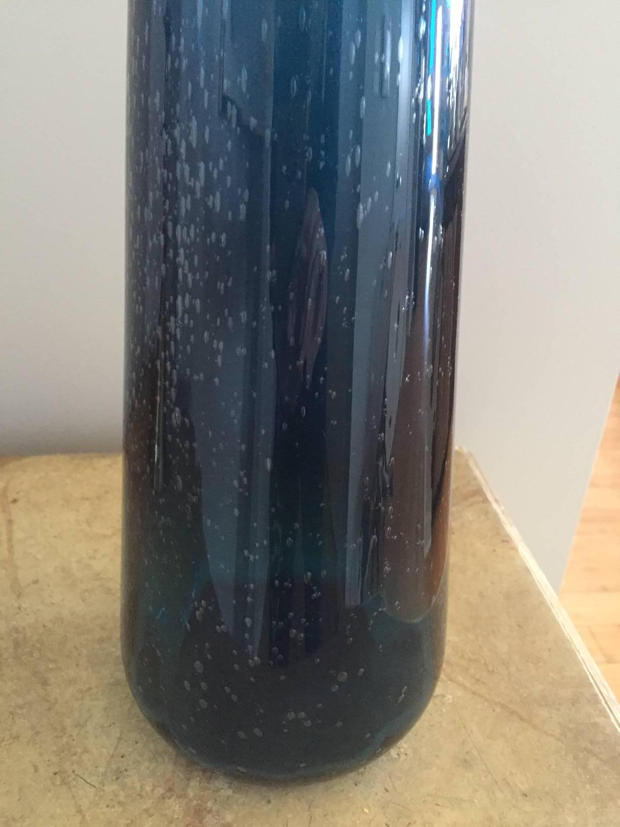 Deep blue glass vase signed by artist on bottom.