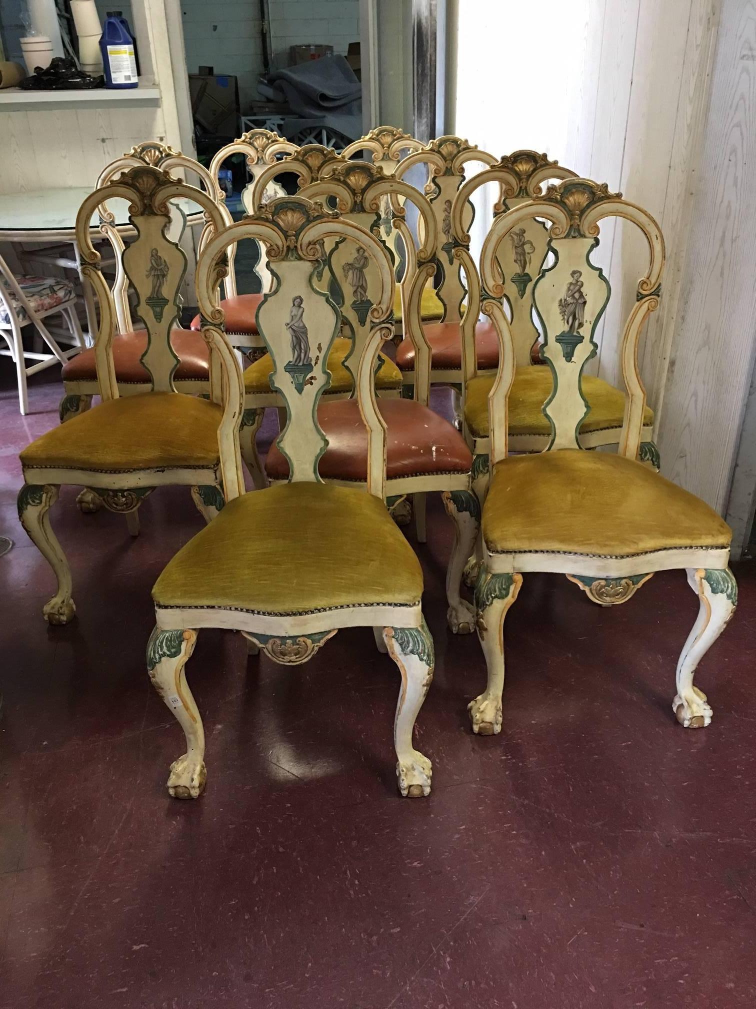 Painted chairs with maidens and ball and claw feet.