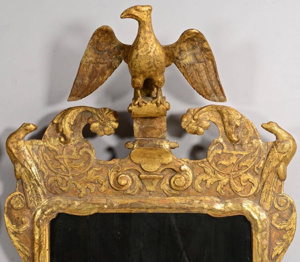 English Pair of George II Giltwood Mirrors with Eagles