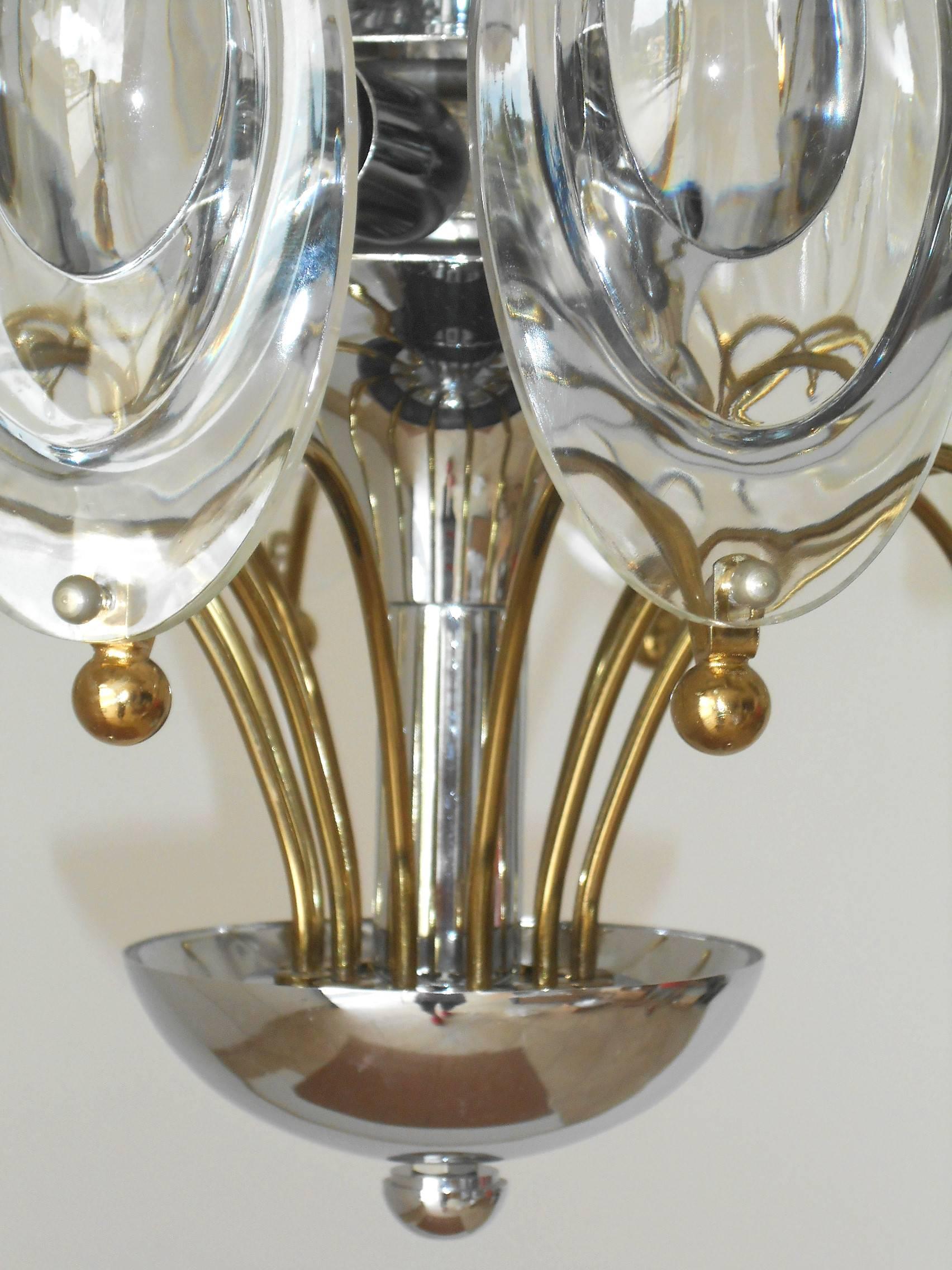 Vintage Italian chandelier or pendant with cut-glass lenses, mounted on chrome and brass frame / Designed by Sciolari circa 1960’s / Made in Italy 
6 lights / E12 or E14 type / max 40W each
Diameter: 20 inches / Height: 35.5 inches including rod and