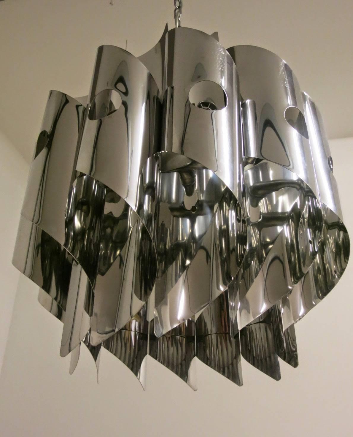 Vintage Italian pendant with 12 chrome spirals / Designed by Sciolari circa 1970’s / Made in Italy 
12 lights / E12 or E14 type / max 40W each
Diameter: 22 inches / Height: 22 inches plus chain and canopy
1 in stock in Palm Springs currently ON 50%