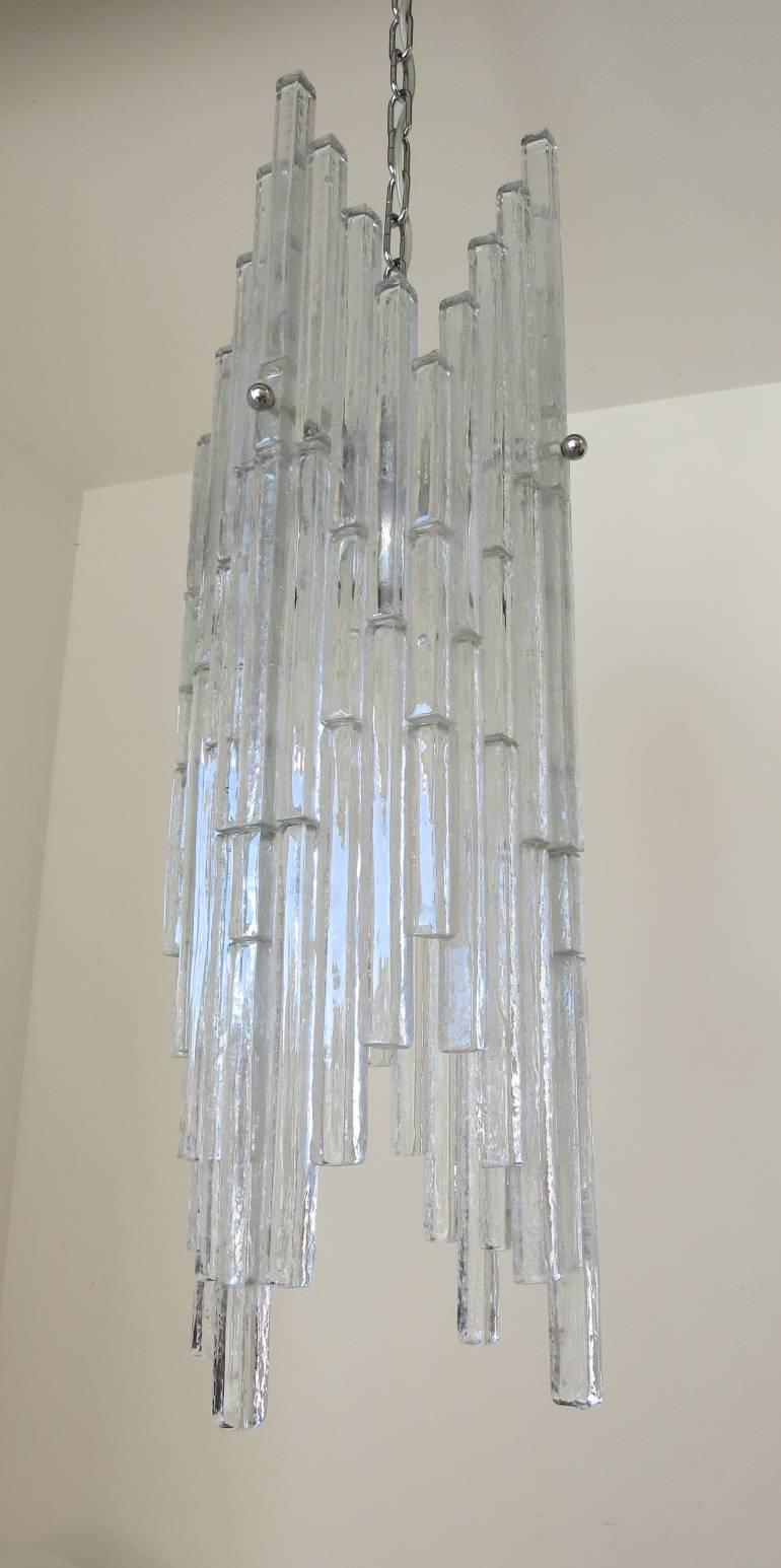 Vintage Italian pendant with clear Murano glass rods, mounted on chrome frame / Designed by Poliarte circa 1970’s / Made in Italy 
1 light / E26 or E27 type / max 60W 
Height: 30 inches / Diameter: 10.5 inches 
1 in stock in Palm Springs currently