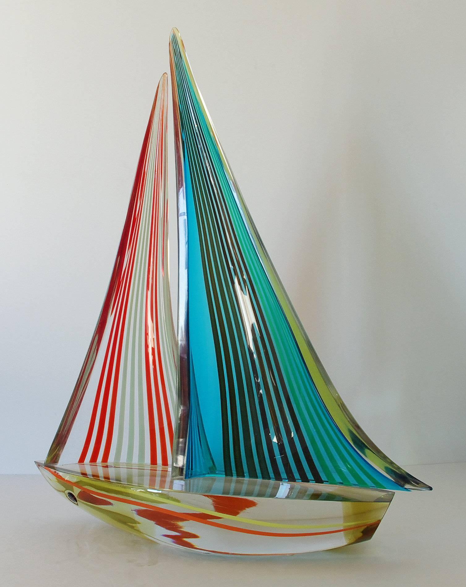 Vintage Italian double sail boat hand blown and crafted in multi color Murano glass by Alberto Dona'
Signed “Alberto Dona” on the base / Made in Italy in the 1980’s 
Height: 21 inches / Width: 17 inches / Depth: 6 inches 
1 in stock in Palm Springs