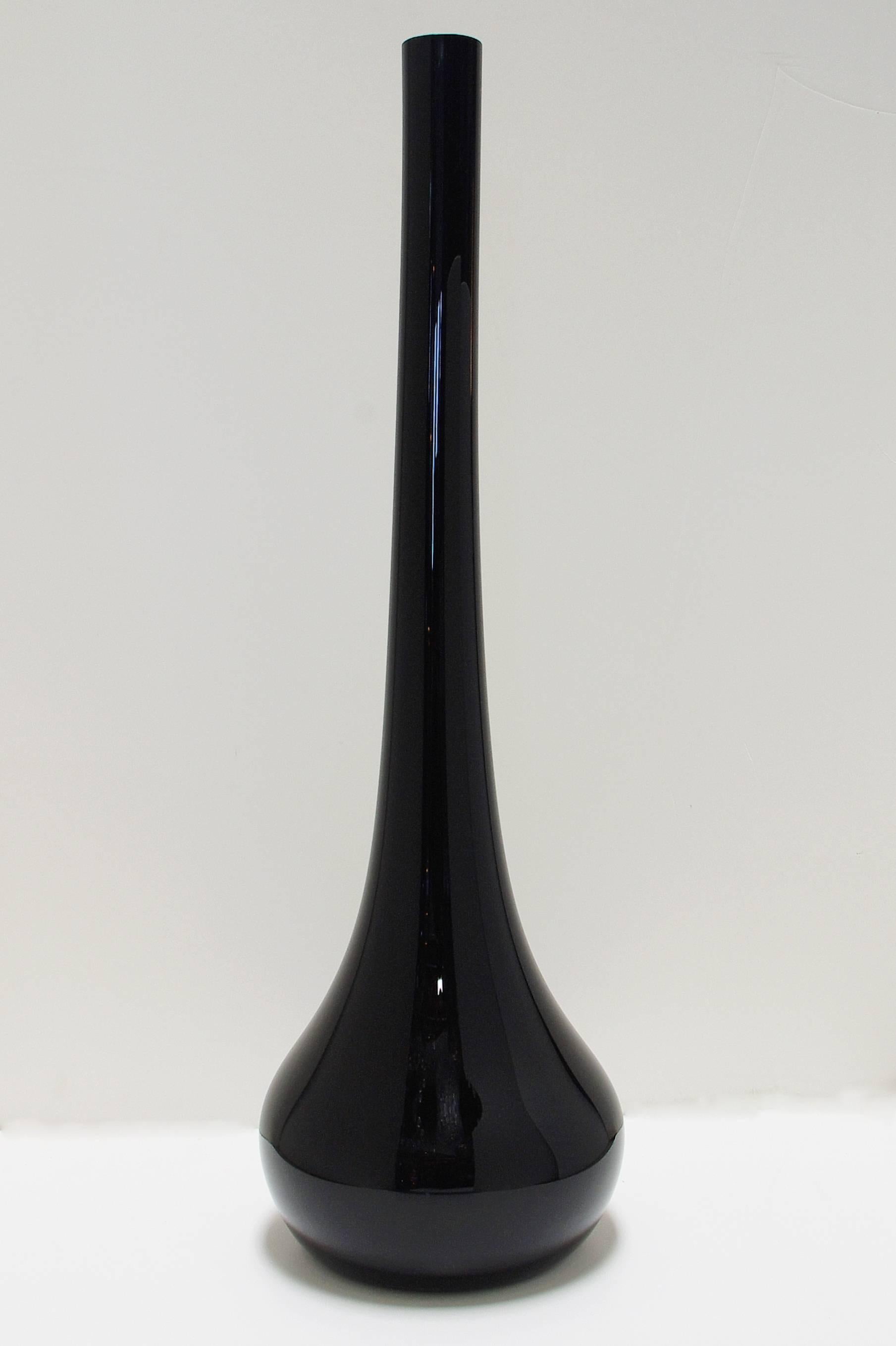 Tall Italian Murano black glass vases
