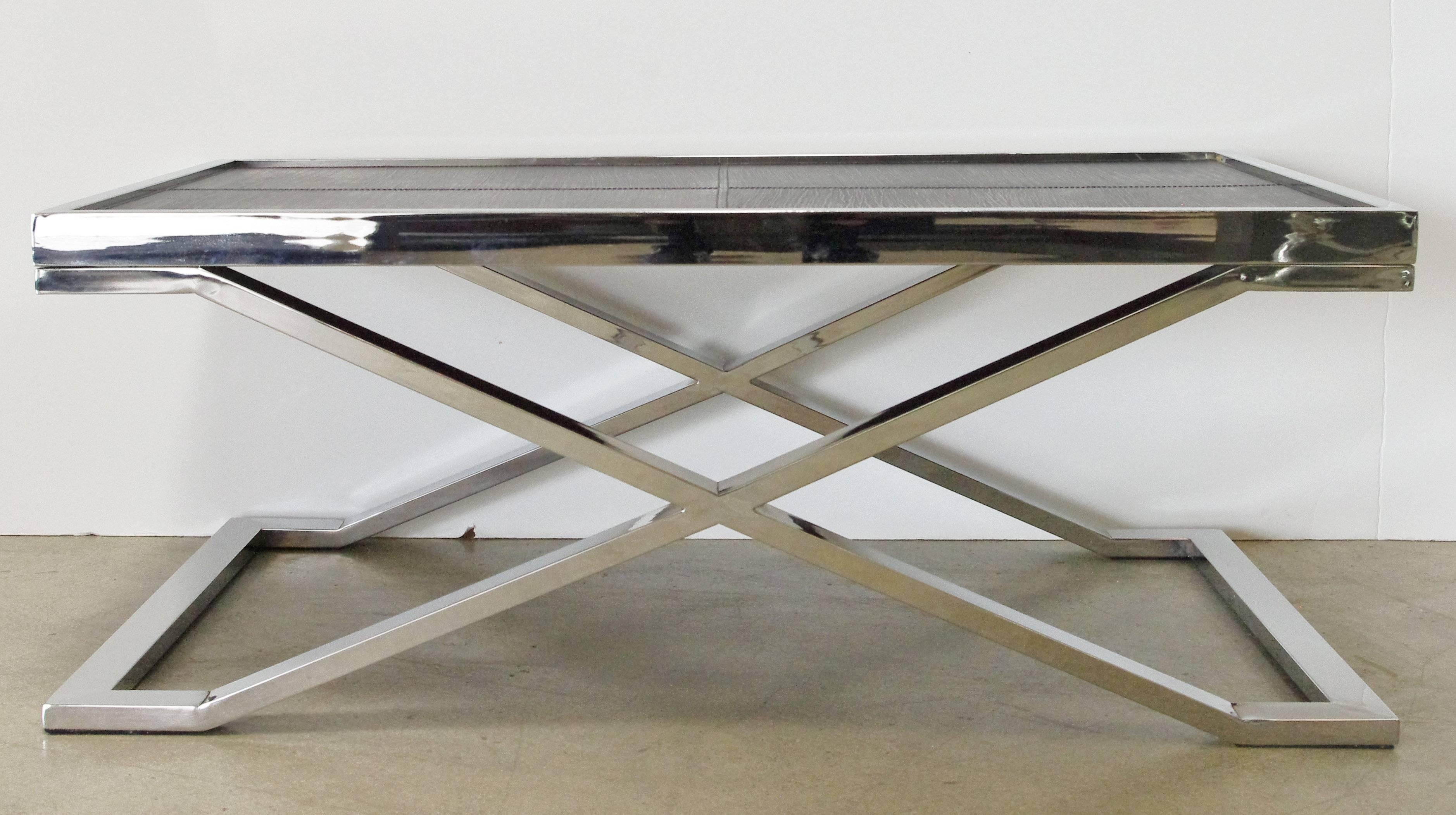 Stainless steel coffee table with pressed black leather designed by Fabio Bergomi / Made in Italy
Depth: 24 inches / Width: 39.5 inches / Height: 16 inches 
1 in stock in Palm Springs ON FINAL CLEARANCE SALE for $1,249!!!
Order Reference #: FABIOLTD