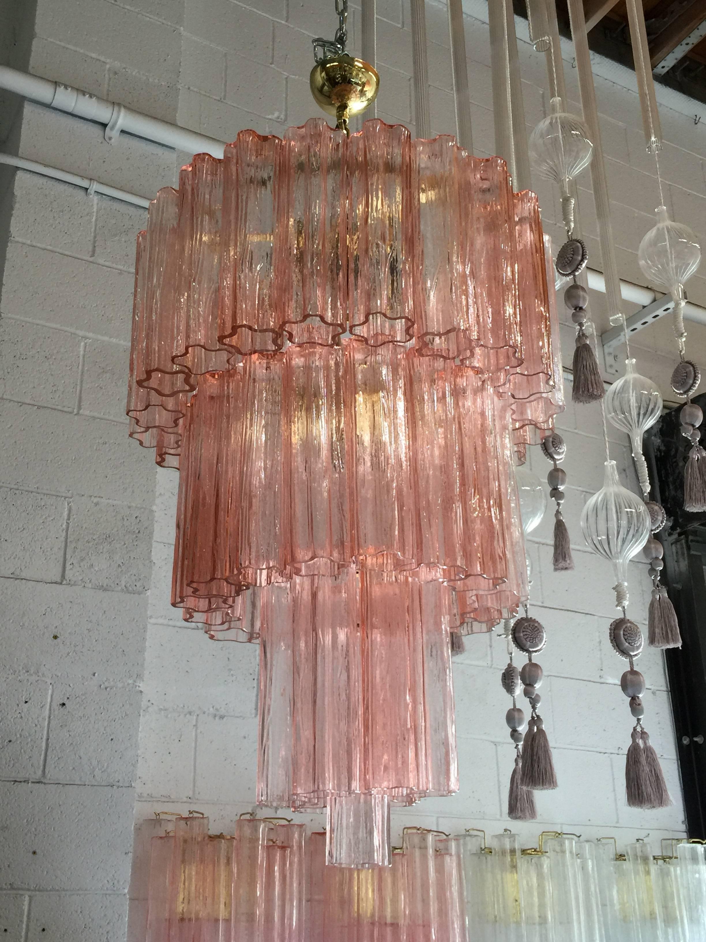Italian Murano pink tronchi glass chandeliers by Venini. 
Four light sockets / wired for U.S.