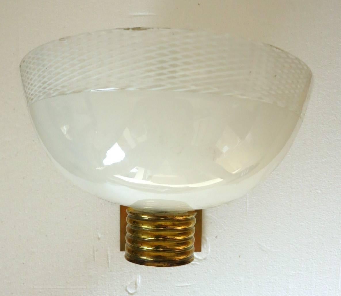 Vintage wall light with Murano ribbed white glass bowl shade mounted on brass arm and backplate / Designed by Venini, circa 1930s / 