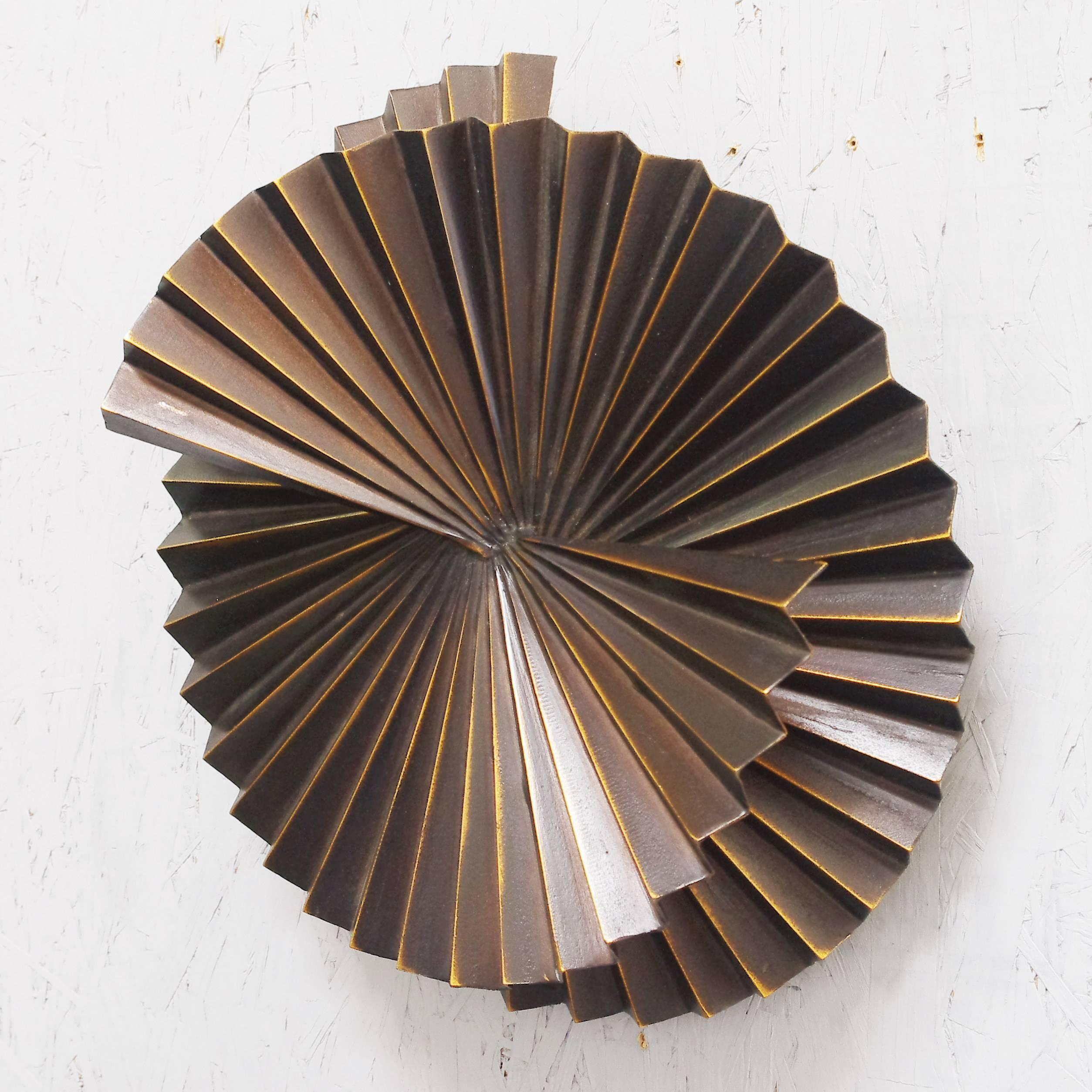Limited edition pair of dark bronzed metal sconces or wall sculptures with spiral fan design / Designed by Fabio Bergomi for Fabio Ltd 
1 light / E26 or E27 type / max 60W
Diameter: 16 inches / Depth: 7 inches
1 pair in stock in Palm Springs