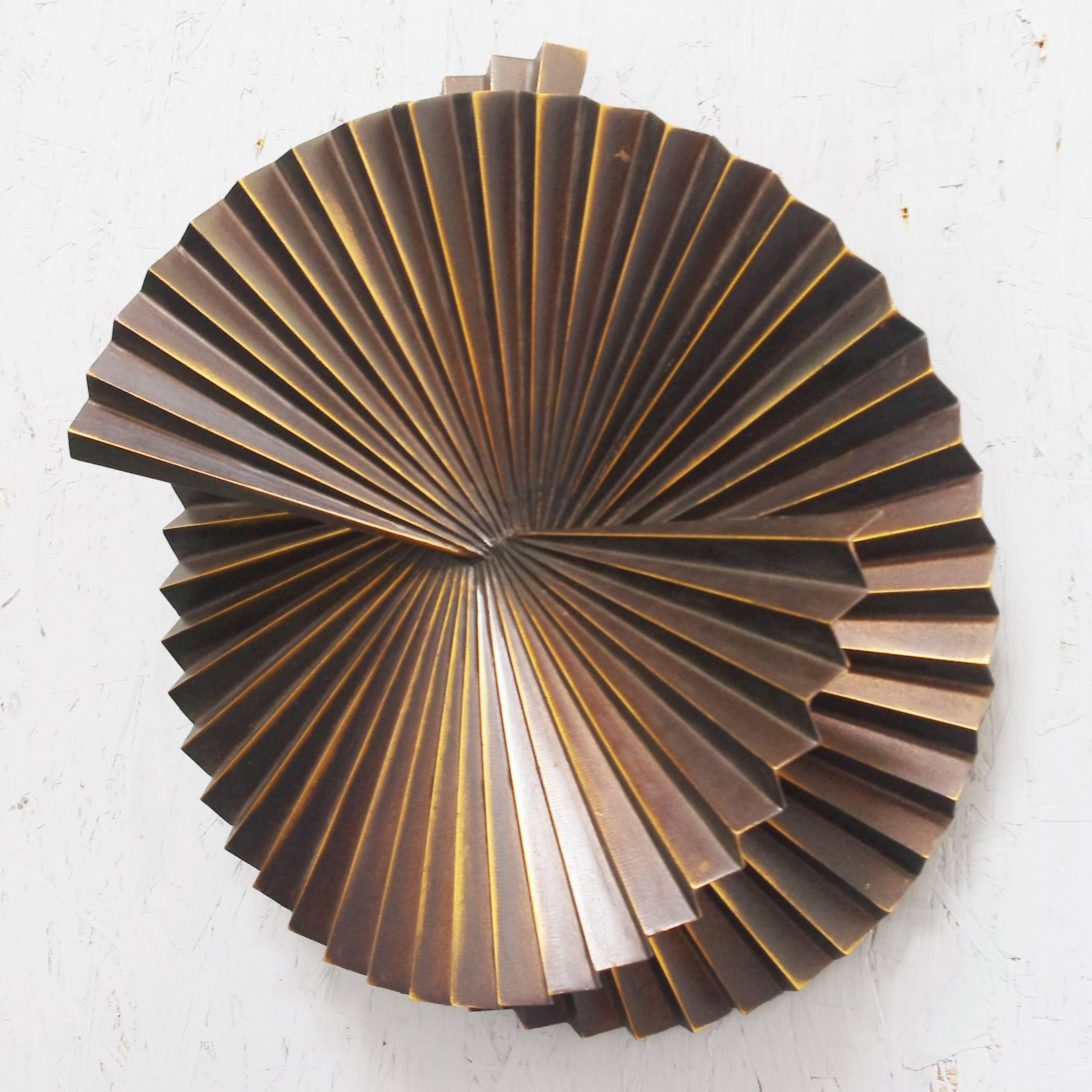 Limited edition pair of medium dark bronzed metal sconces or wall sculptures with spiral fan design / Designed by Fabio Bergomi for Fabio Ltd 
1 light / E26 or E27 type / max 60W
Diameter: 19 inches / Depth: 7 inches 
1 pair in stock in Palm Springs
