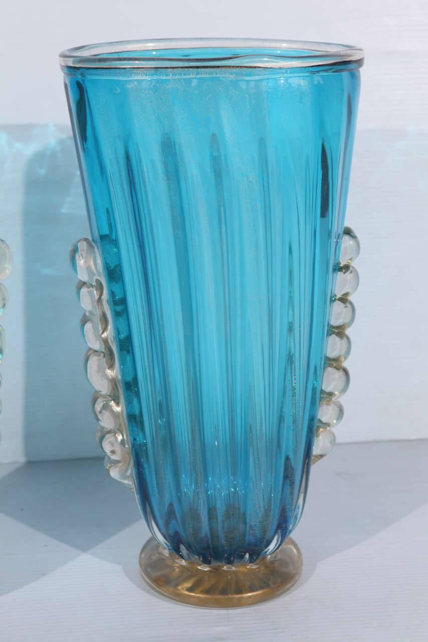 Pair of Italian Murano Glass Aquamarine Vases with Gold Flecks by Alberto Dona' 
Can also be purchased individually ; price listed is for the pair.
Signature engraved on the base