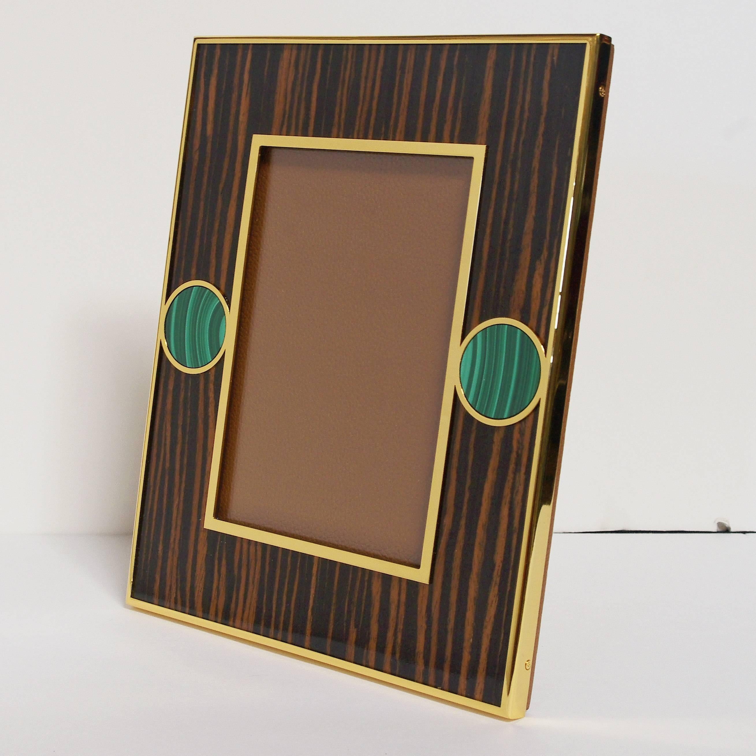 Brown Macassar photo frames with round malachite 
For photo size 5 in x 7 in
This piece is a great addition to your Christmas and holiday home decor!!!