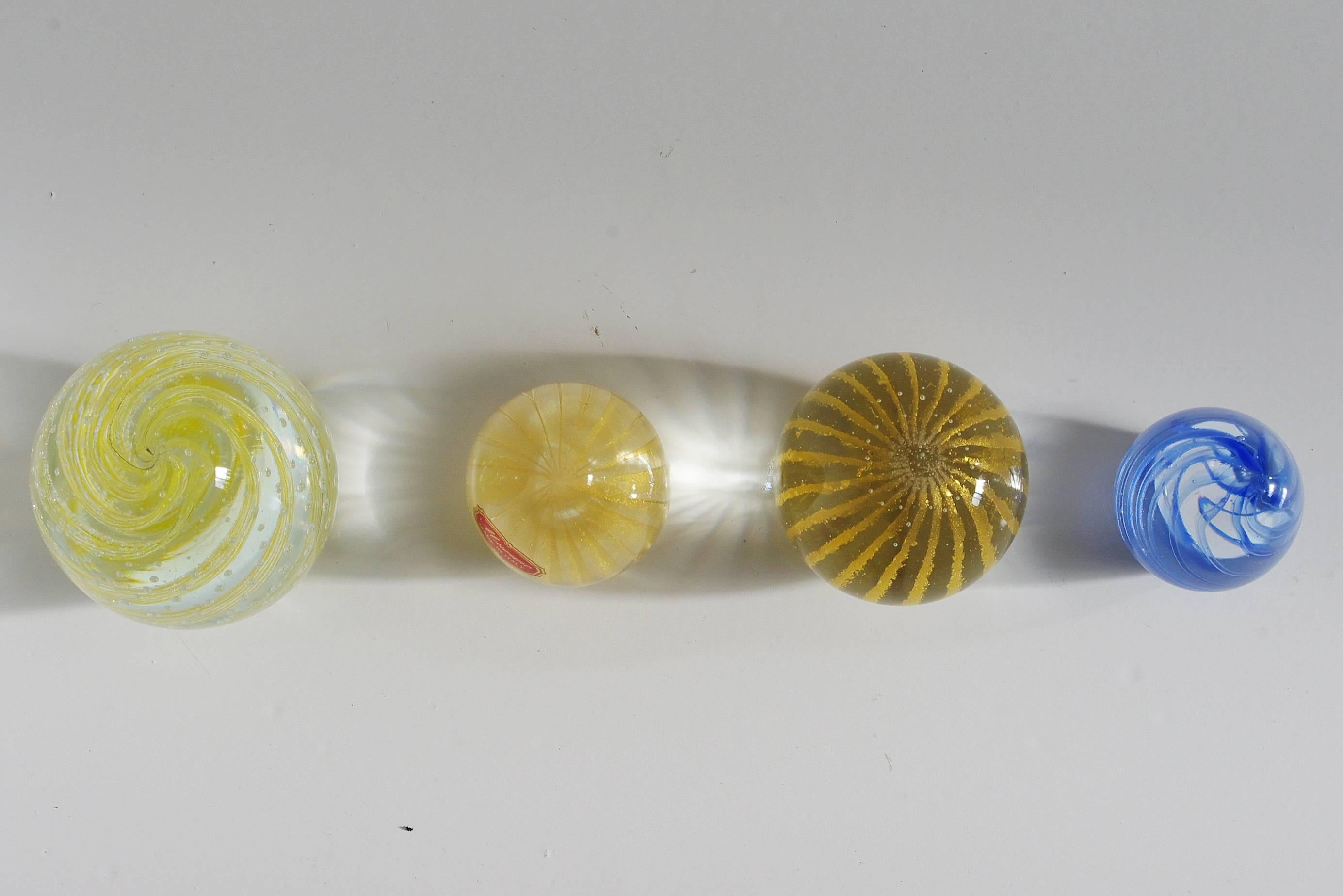 Mid-Century Modern Collection of Four Italian Murano Glass Paperweights with Gold and Stripes