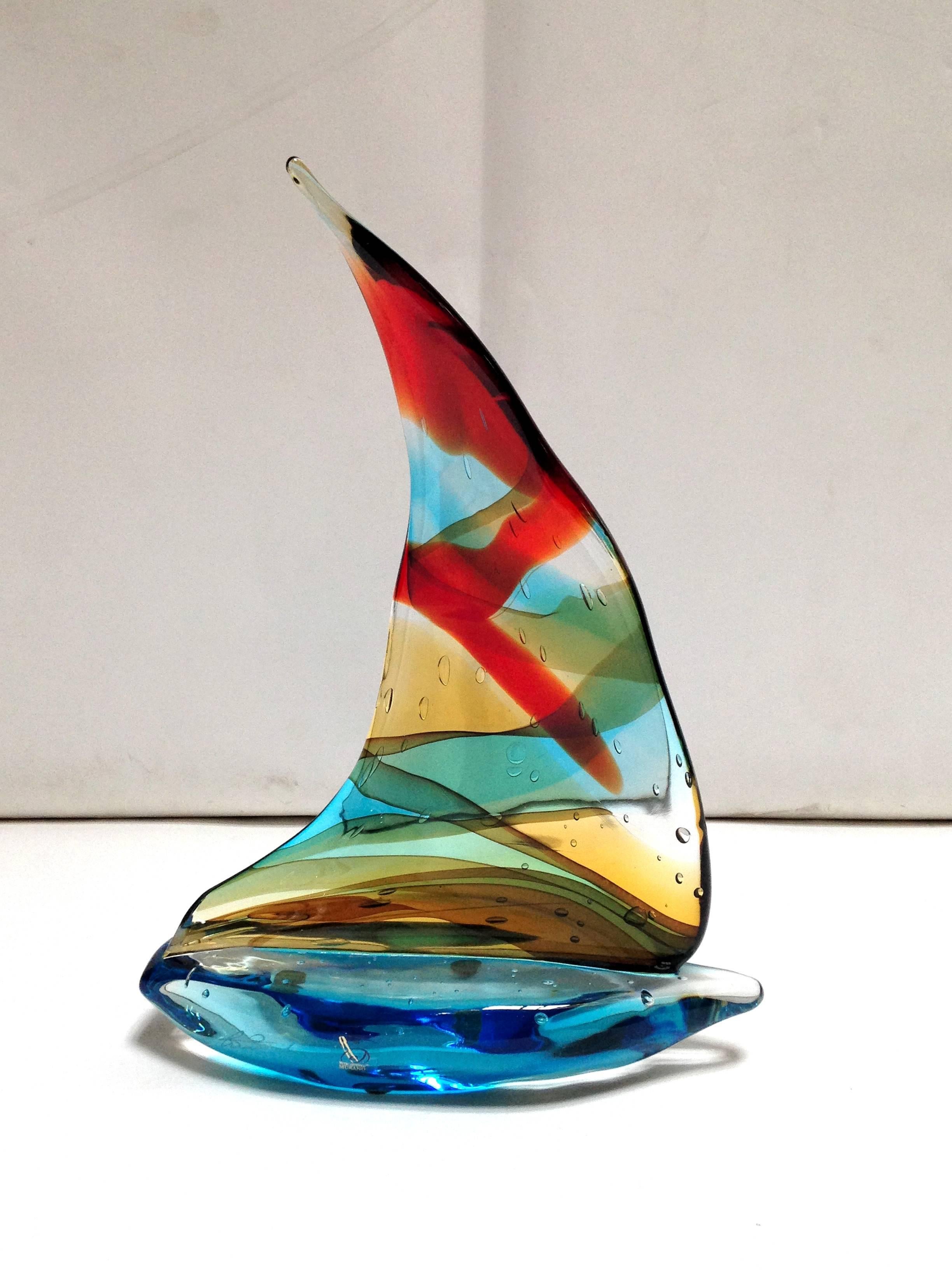 Italian vintage single sail boat hand blown and crafted in multiple colors of Murano glass by Sergio Constantini, signed on the base / Made in Italy in the 1960’s
Depth: 3.5 inches / Width: 10 inches / Height: 14 inches
1 in stock in Palm Springs