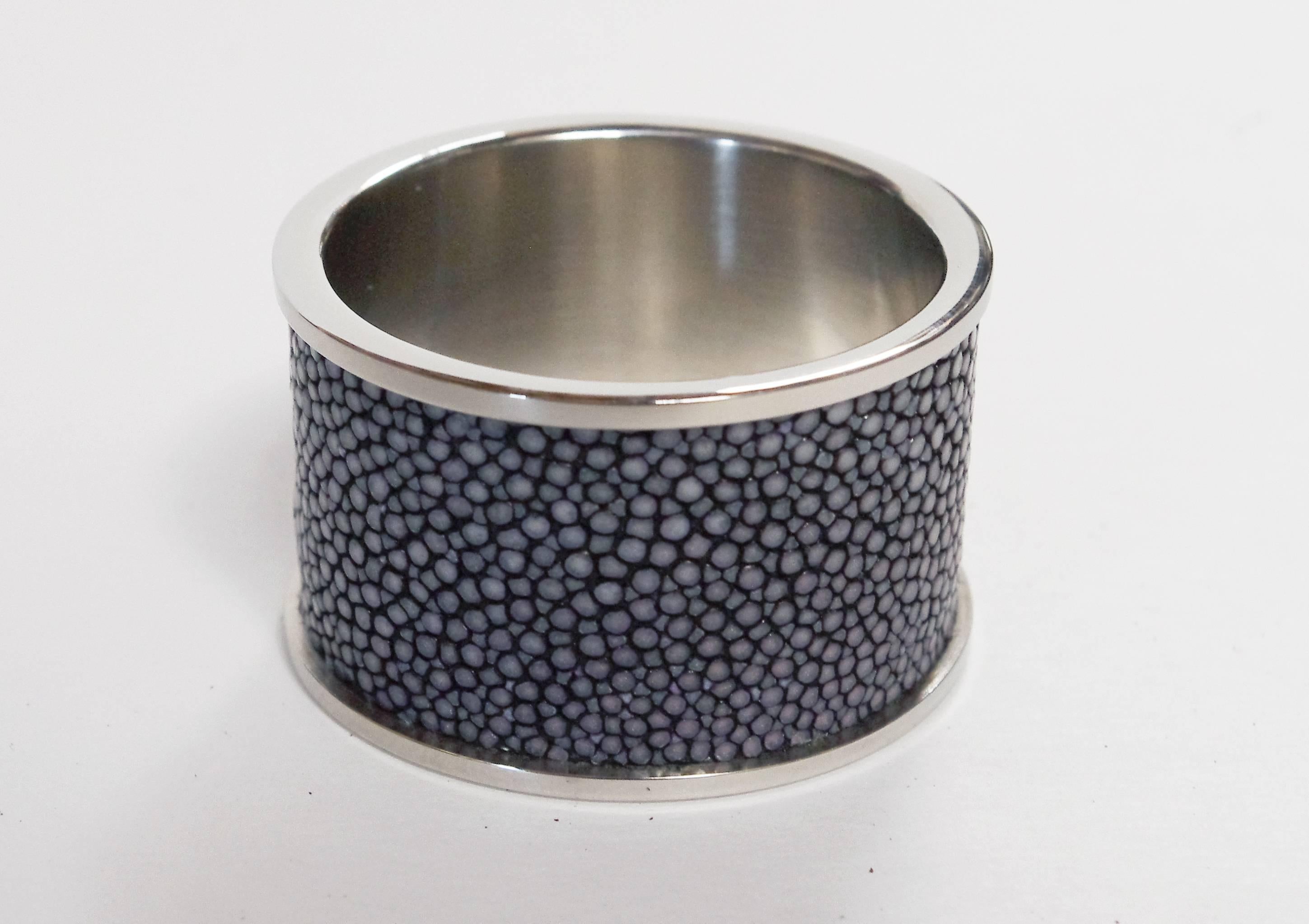 Italian black shagreen and stainless steel napkin rings with matching black leather box designed by Fabio Bergomi for Fabio Ltd / Made in Italy 
Each ring has diameter 1.5 inches and width 1 inch
We have 6 sets available, currently ON 30% OFF SALE