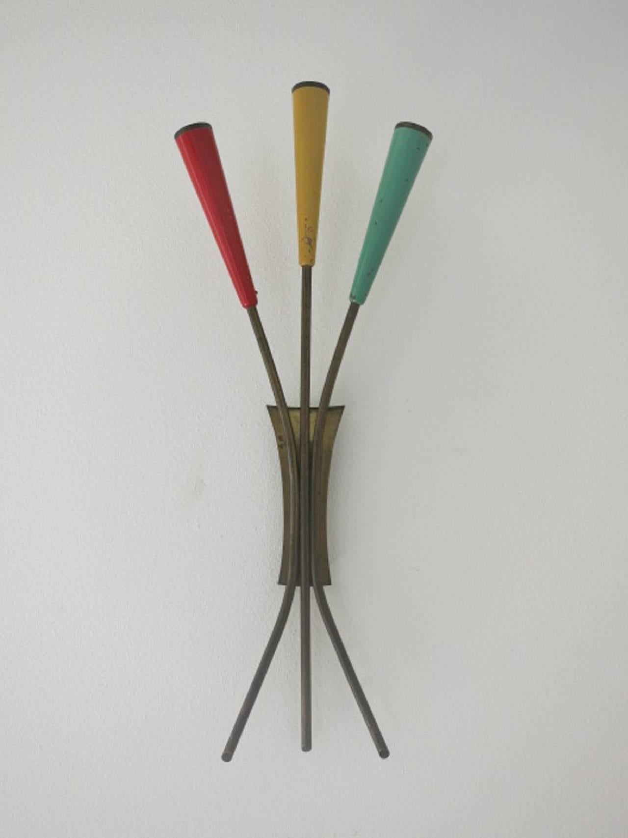 Pair of vintage Italian wall lights with red, green and yellow enameled brass / Designed by Stilnovo, circa 1950’s / Made in Italy
3 lights / E12 or E14 type / max 40W each
Height: 21.5 inches / Width: 8.5 inches / Depth: 2 inches
1 pair in stock in