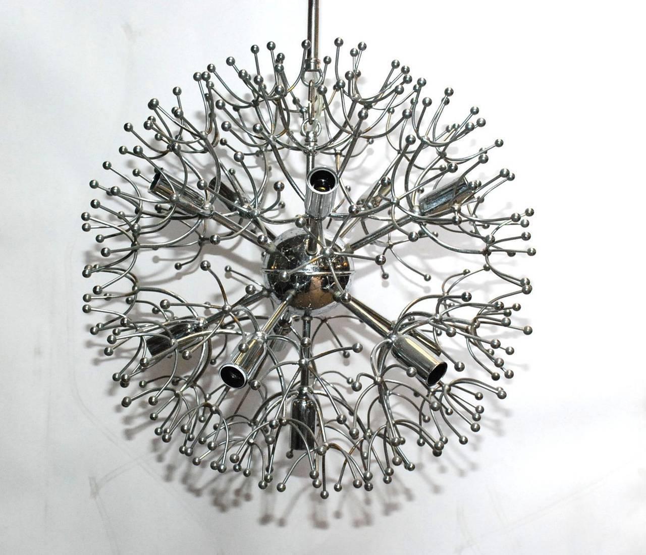 Vintage Italian chrome sputnik with curved and minuscule sphere details / Designed by Sciolari circa 1970’s / Made in Italy
11 lights/ E14 type / max 40W each
Diameter: 18 inches / Height: 26 inches including rod and canopy 
1 in stock in Palm