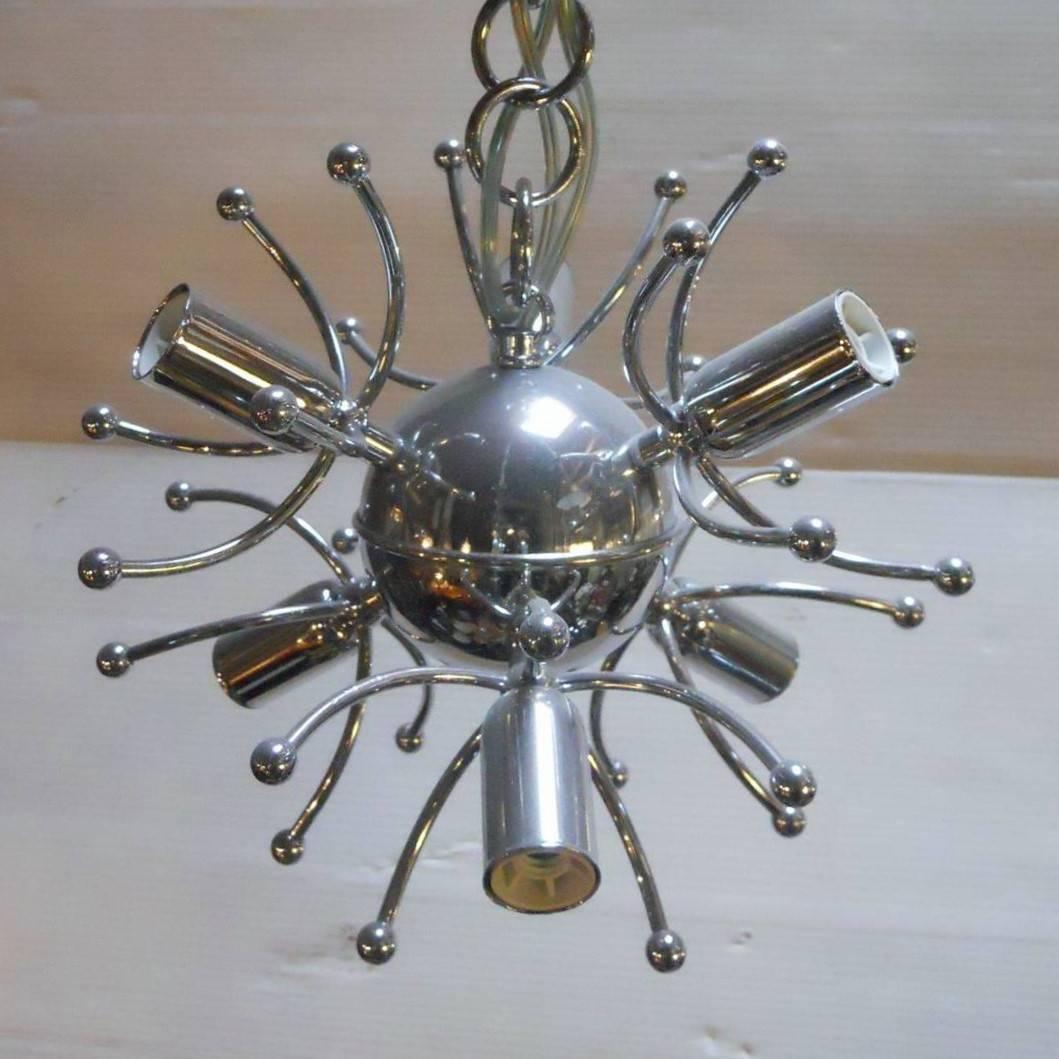 Vintage Italian chrome sputnik with curved and minuscule sphere details / Designed by Sciolari circa 1970’s / Made in Italy
6 lights / E14 type / max 40W each
Diameter: 12 inches / Height: 22 inches including chain and canopy 
1 in stock in Palm