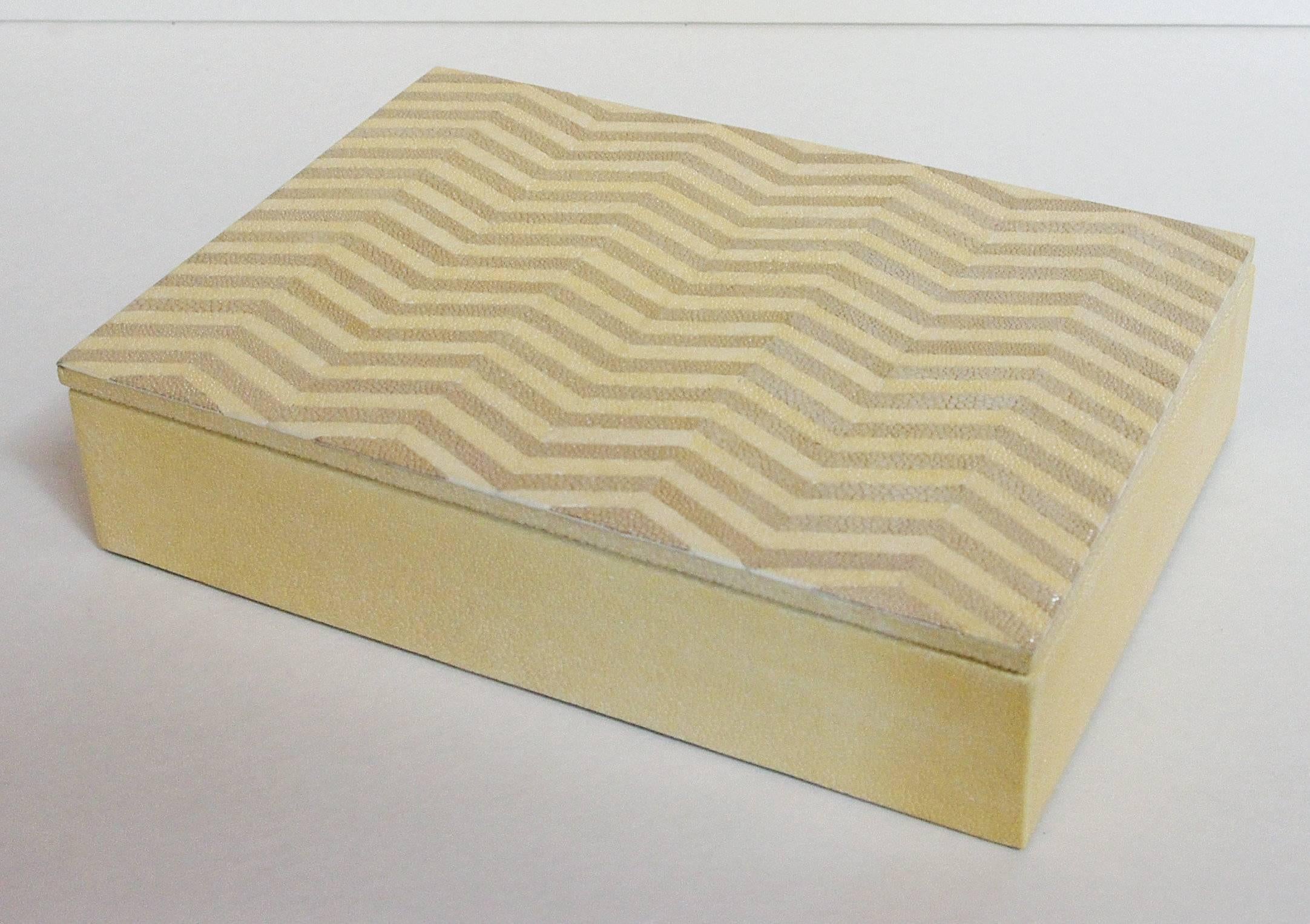 Ivory and brown Shagreen box with zigzag pattern and gray suede interior
Width: 10 inches / Depth: 7 inches / Height: 2.5 inches
1 in stock in Palm Springs ON FINAL CLEARANCE SALE for $595 !!! 
Order Reference #: FABIOLTD MR20
This piece makes for
