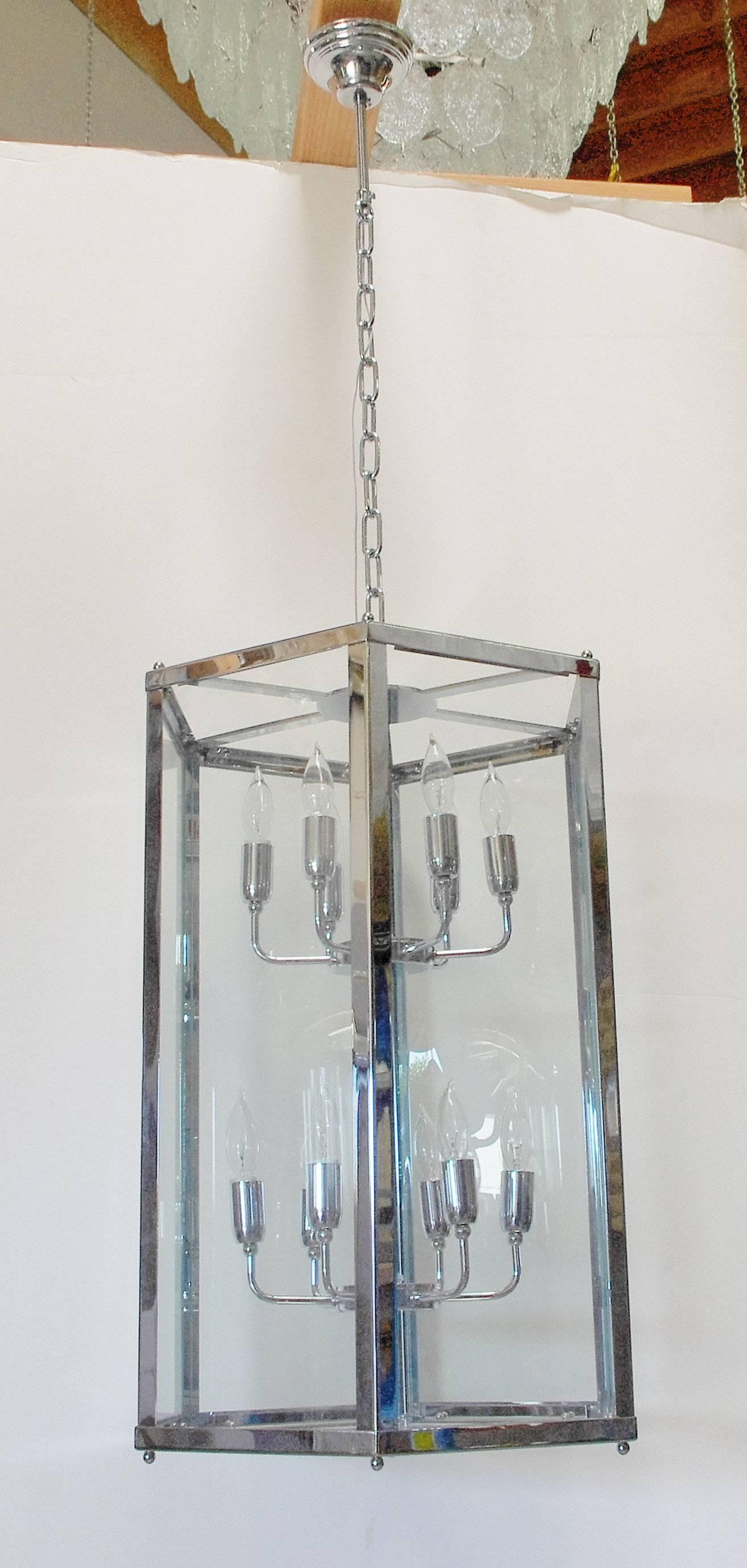 One of a kind modern Italian hexagon shaped lantern with glass and chrome frame / Designed by Fabio Bergomi for Fabio Ltd / Made in Italy
12 lights / E12 or E14 type / max 40W each
Height: 29 inches plus chain and canopy / Diameter: 20 inches
1 in