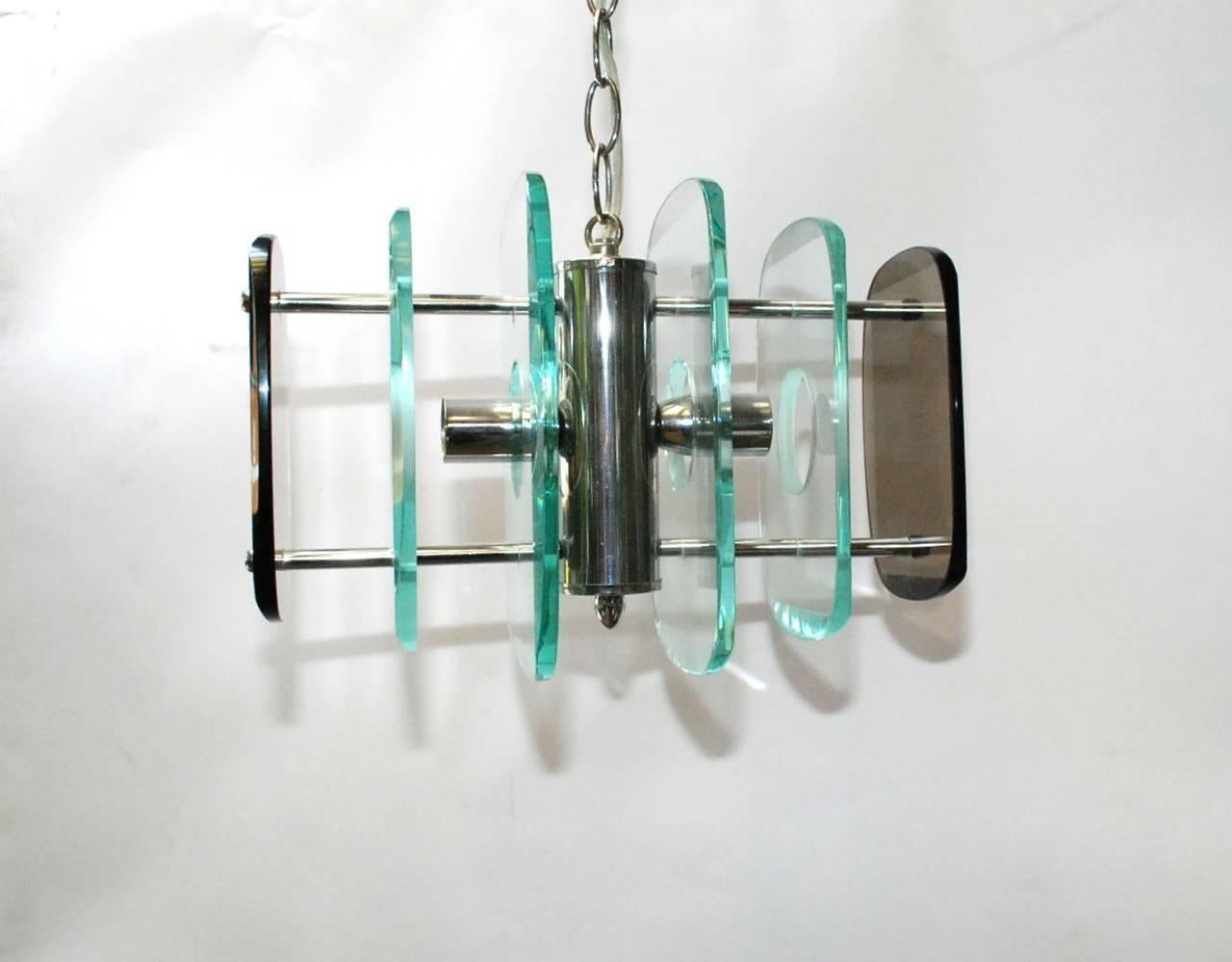 Vintage Italian pendant with clear and smoky beveled glass rectangular panels, mounted on chrome frame / In the style of Fontana Arte / Made in Italy circa 1960’s 
2 lights / E12 or E14 type / max 40W each
Height: 10 inches plus chain and canopy /