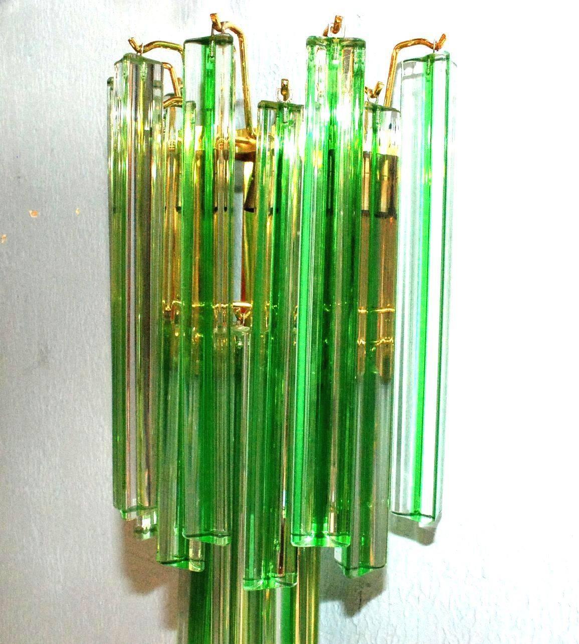 Set of six Italian sconces with Murano glass triedri crystals with green stripes on brass frame.
Two candelabra light sockets each sconce, wired for the U.S.
Can be purchased individually, price listed is for one sconce.