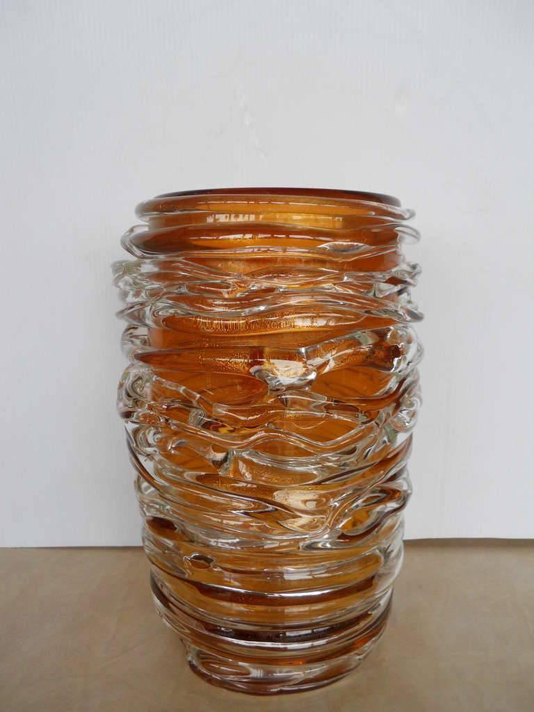 Vintage Italian mid-century amber Murano glass vase with hand blown clear twirls by Pino Signoretto / Made in Italy in the 1960’s
Signed “Pino Signoretto” on the base
Height: 15.25 inches / Diameter: 10 inches
1 in stock in Palm Springs currently ON