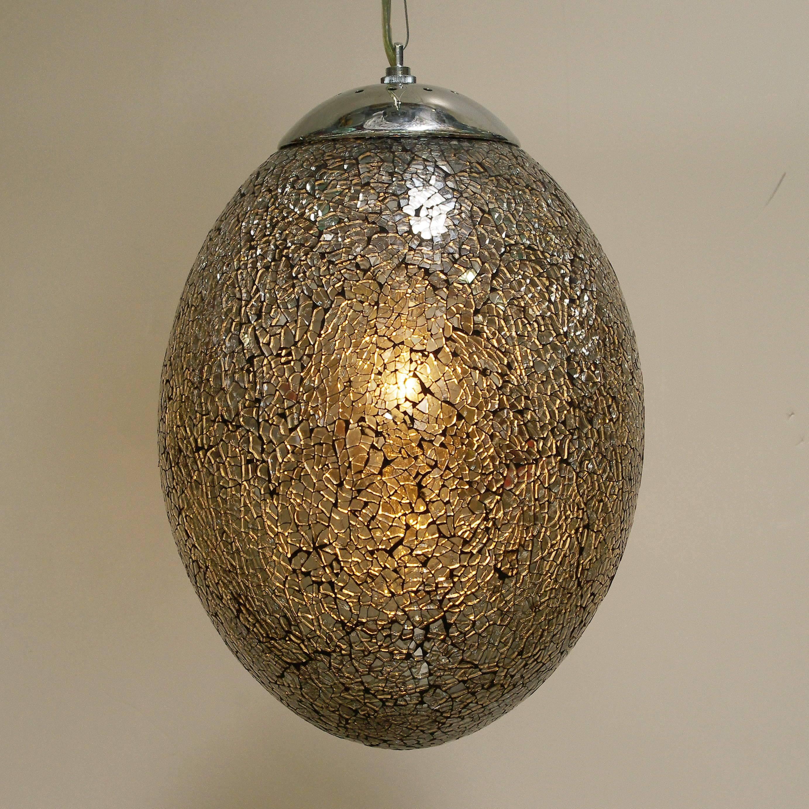 Crackled mirrored glass egg shaped pendants with chrome hardware / Designed by Fabio Bergomi for Fabio Ltd
1 light / E26 or E27 type / max 60W each
Diameter: 11 inches / Height: 17 inches plus chain and canopy
12 in stock in Palm Springs ON FINAL