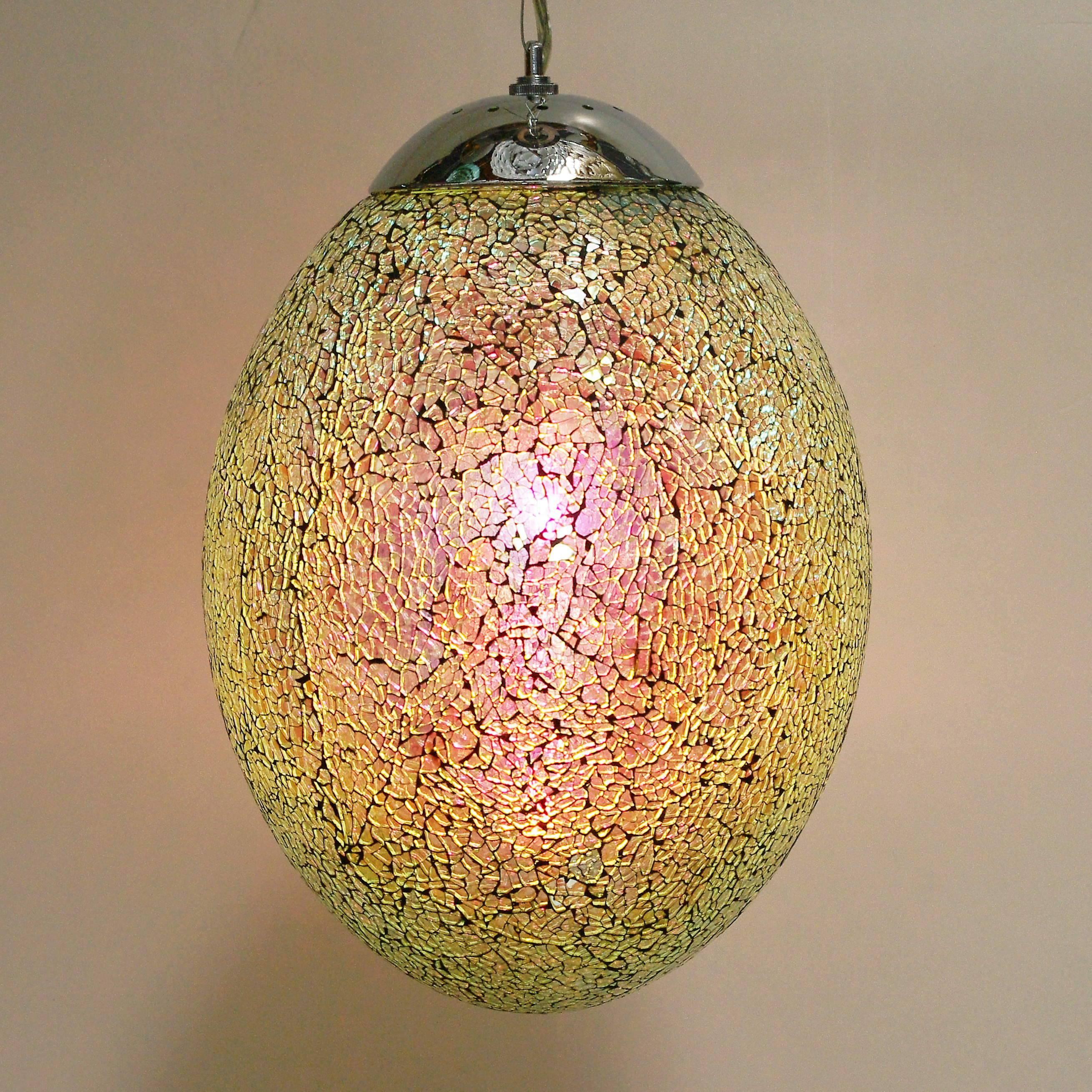 Crackled iridescent glass egg shaped pendants with chrome hardware / Designed by Fabio Bergomi for Fabio Ltd
1 light / E26 or E27 type / max 60W each
Diameter: 11 inches / Height: 17 inches plus chain and canopy
6 in stock in Palm Springs ON FINAL