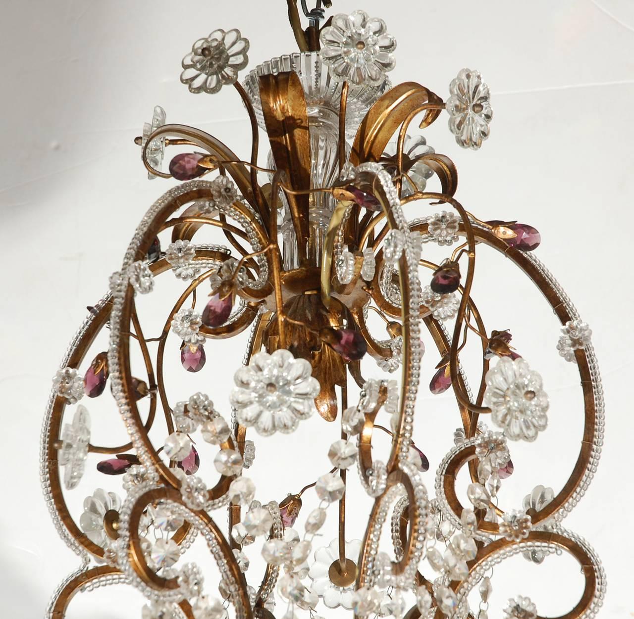 Italian traditional Florentine gilded chandelier with crystals.
Twelve-light sockets / E14 fittings.