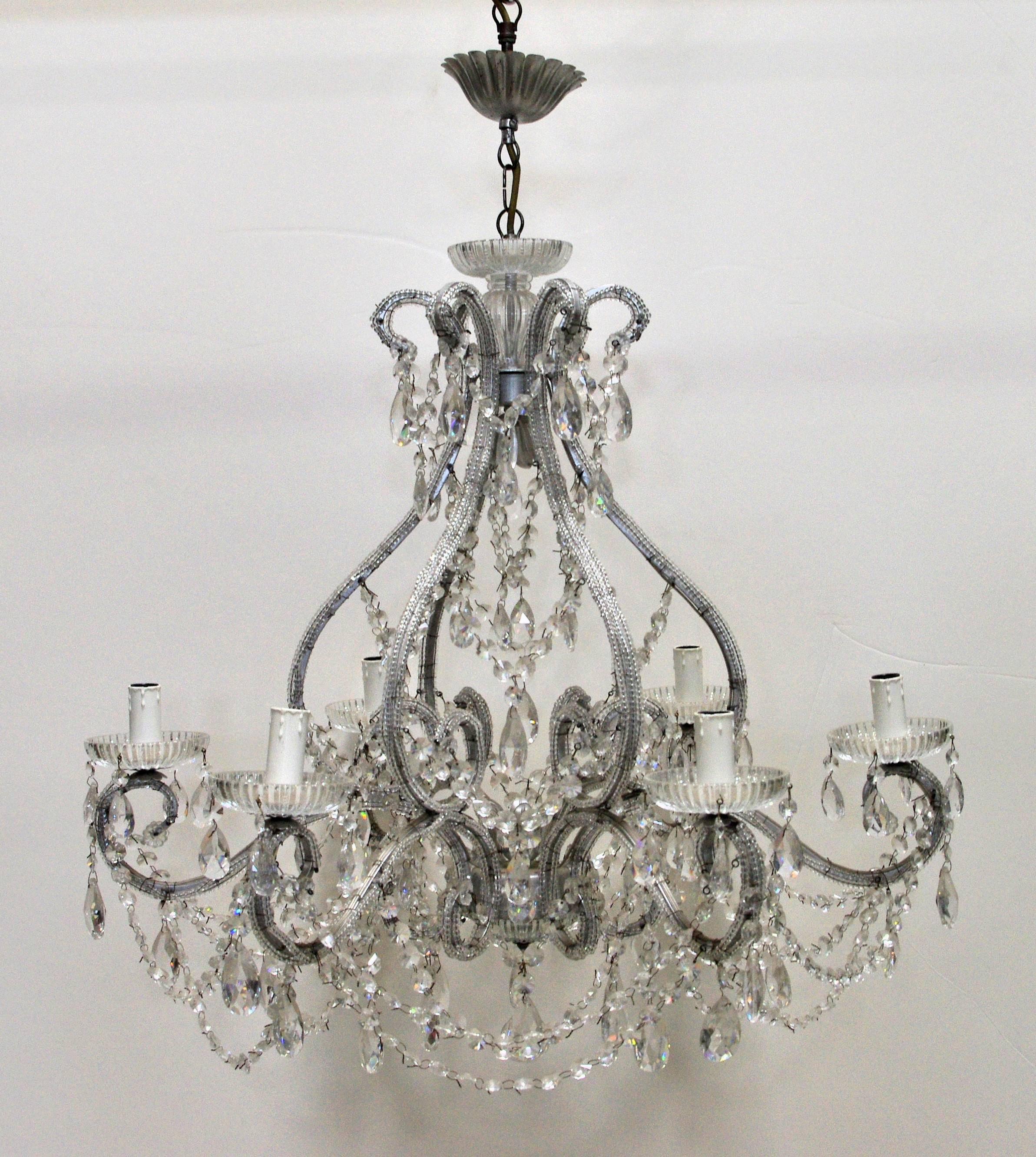 Vintage Italian Florentine chandelier with Swarovski crystals and silvered wrought iron / Made in Italy circa 1960’s
6 lights / E12 or E14 type / max 40W each
Diameter: 28 inches / Height: 32 inches plus chain and canopy
2 in stock in Palm Springs